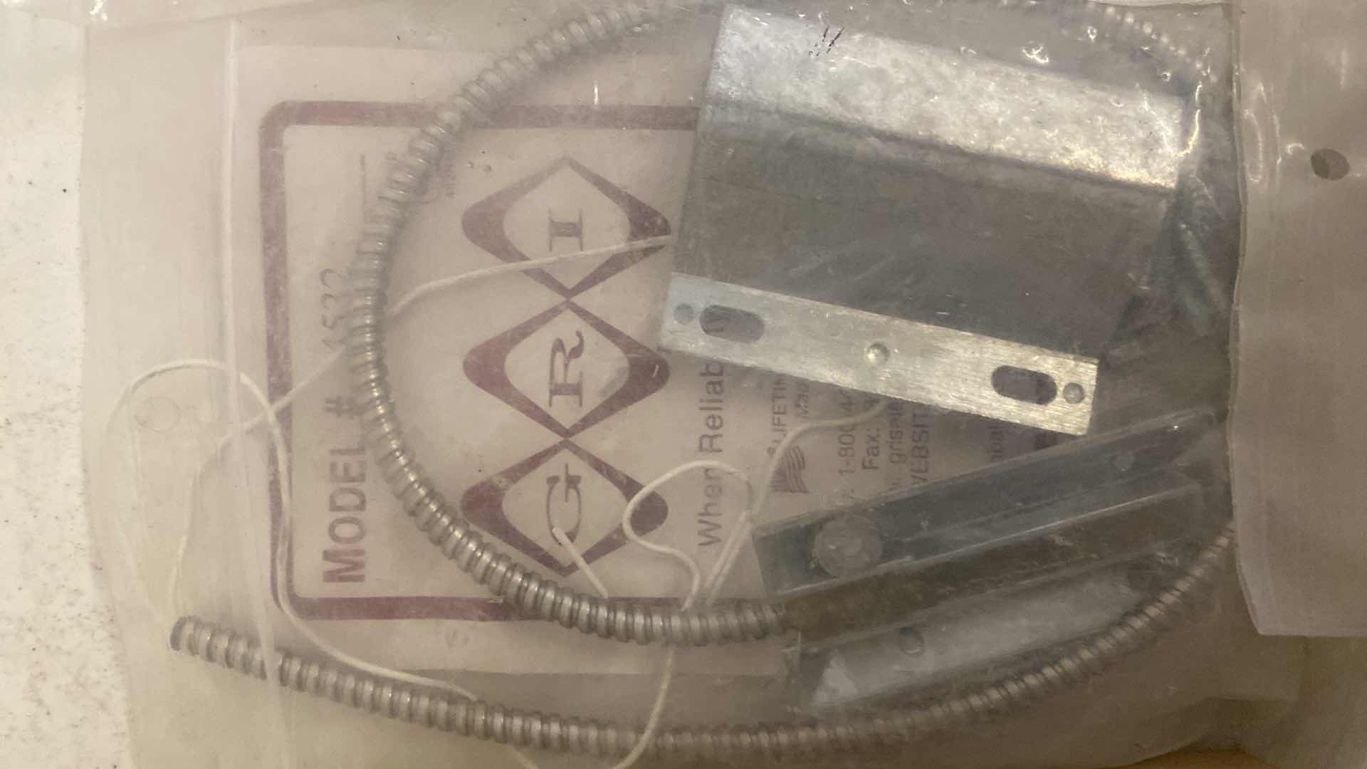 Photo 1 of GEORGE RISK INDUSTRIES MODEL #4532 MINIATURE OVERHEAD DOOR CONTACT
4 AND BOX OF MISCELLANEOUS