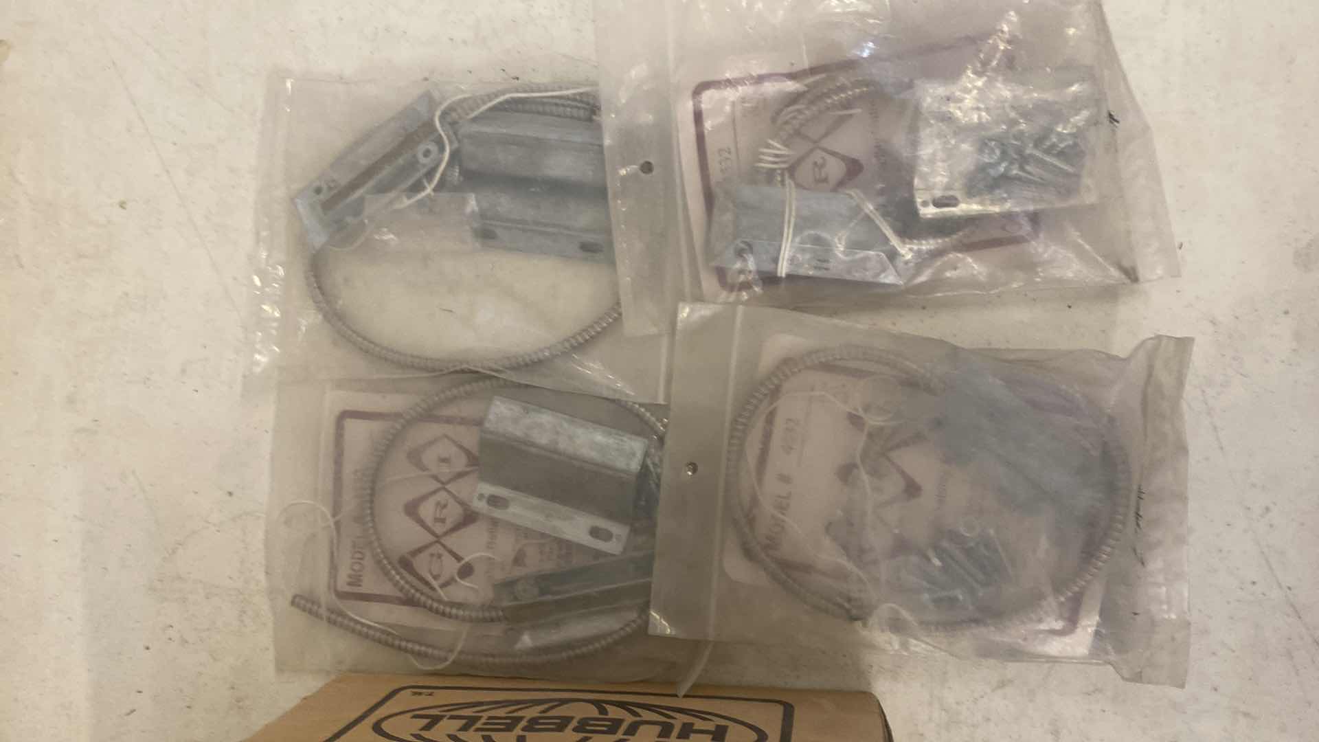 Photo 1 of GEORGE RISK INDUSTRIES MODEL #4532 MINIATURE OVERHEAD DOOR CONTACT
4 AND BOX OF MISCELLANEOUS