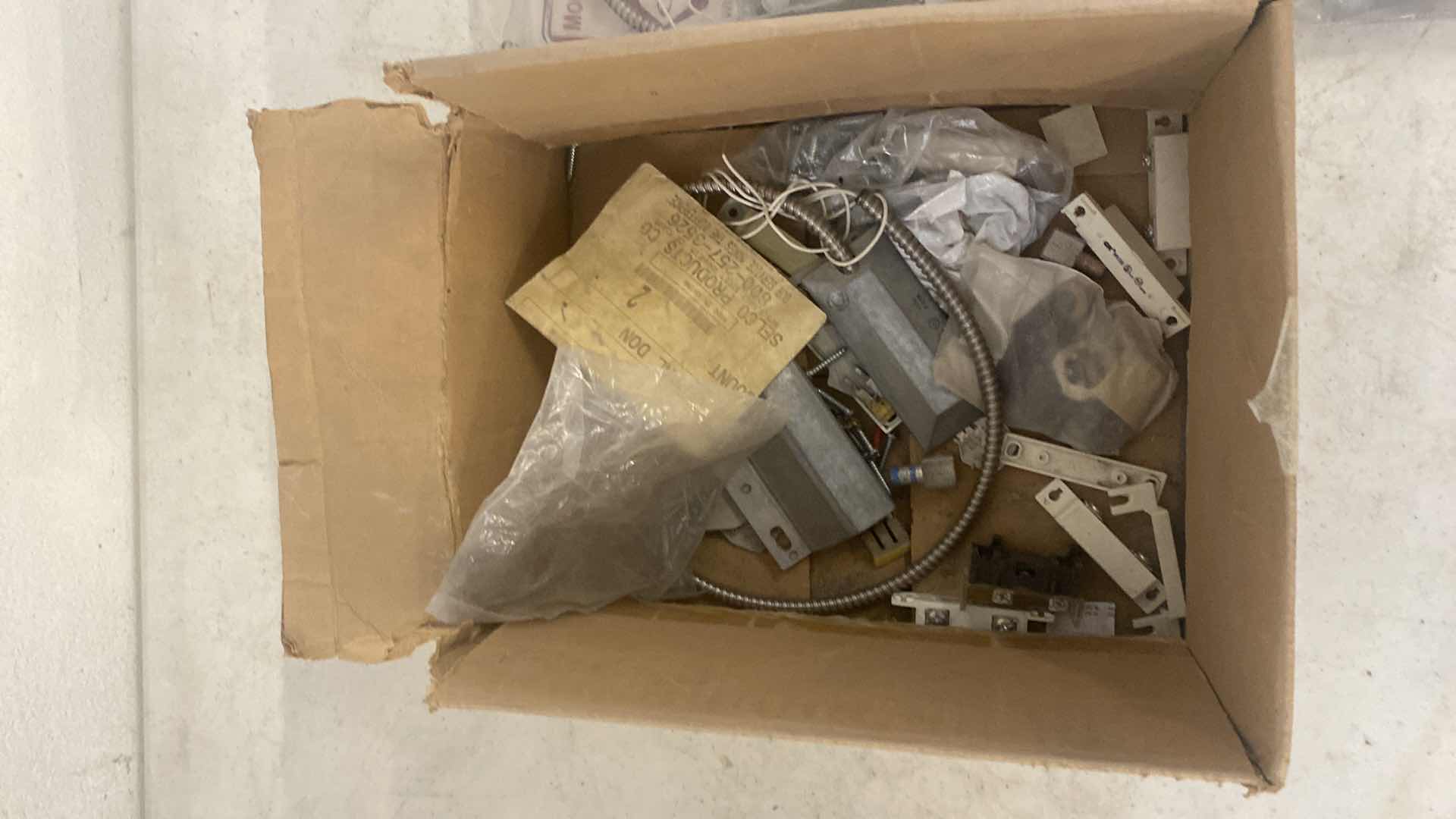 Photo 1 of GEORGE RISK INDUSTRIES MODEL #4532 MINIATURE OVERHEAD DOOR CONTACT
4 AND BOX OF MISCELLANEOUS