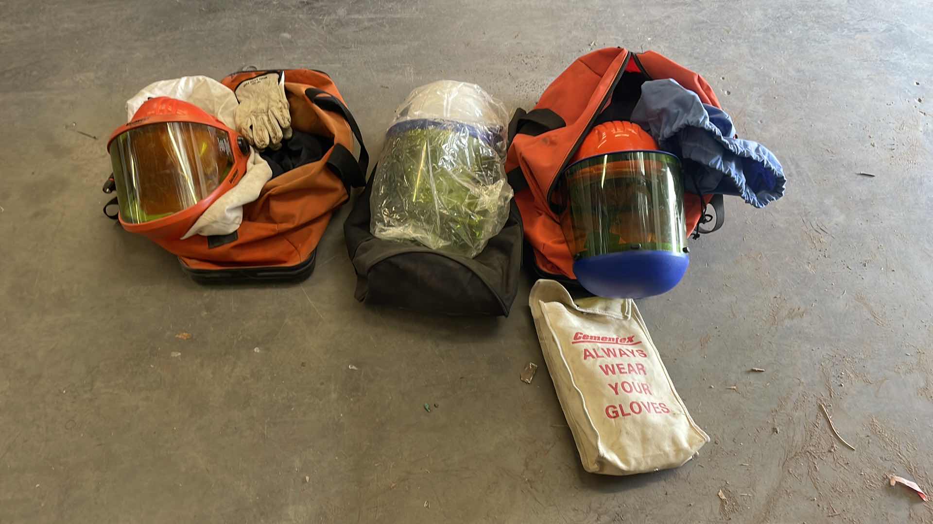 Photo 1 of ARC FLASH SHIELDS (3) GLOVES AND SALISBURY ARC FLASH JACKET SIZE LARGE BULWARK FR SIZE XL LONG SLEEVE SHORT