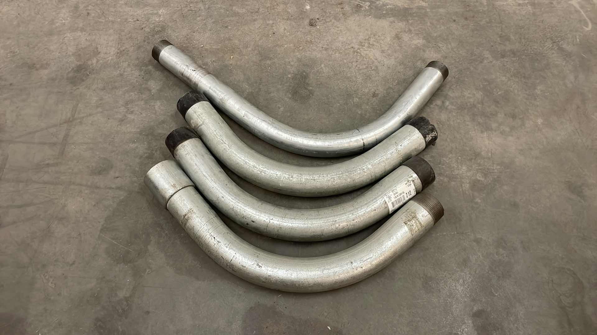 Photo 1 of 2-1/2” GALVANIZED STEEL CONDUIT 90 DEGREE ELBOWS (3) 2” ELBOW (1)