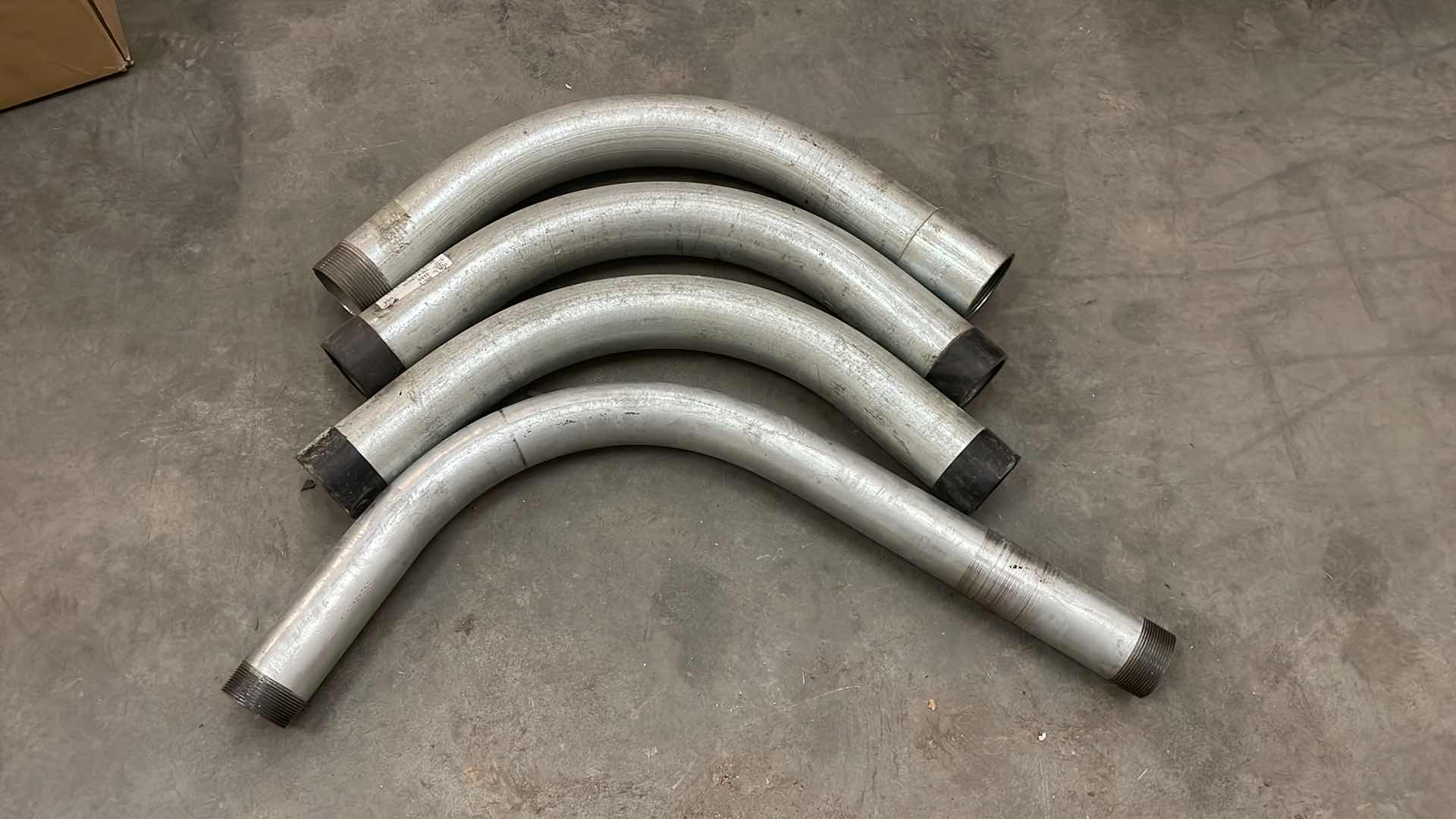 Photo 1 of 2-1/2” GALVANIZED STEEL CONDUIT 90 DEGREE ELBOWS (3) 2” ELBOW (1)