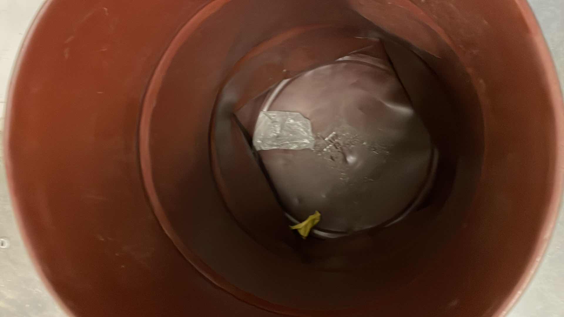 Photo 3 of 55 GALLON METAL TRASH CAN DENTED ON THE BOTTOM