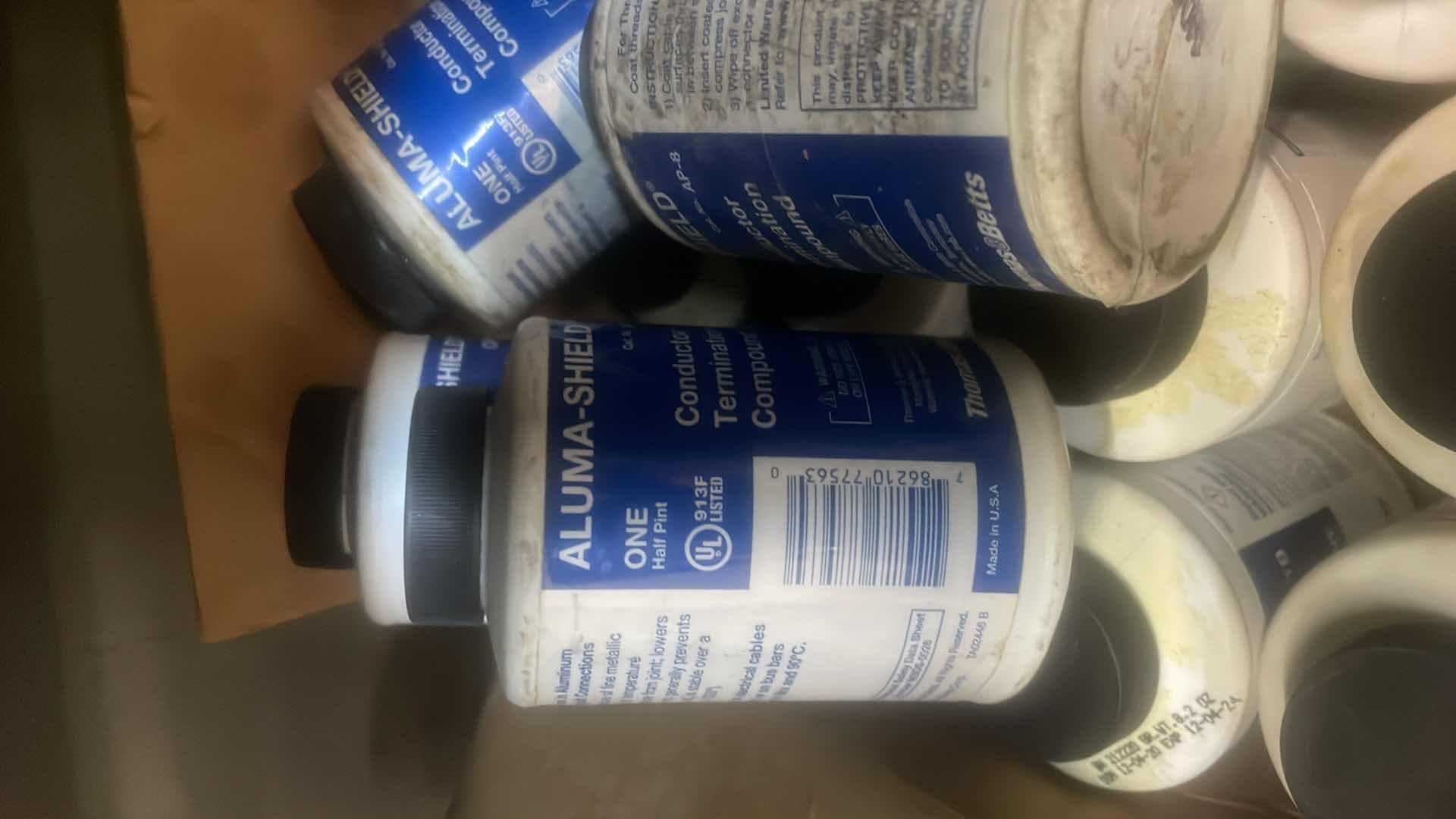 Photo 4 of ANGLED WOOD CABINET 13”-20” x 32” x 84 CONTENTS INCLUDED