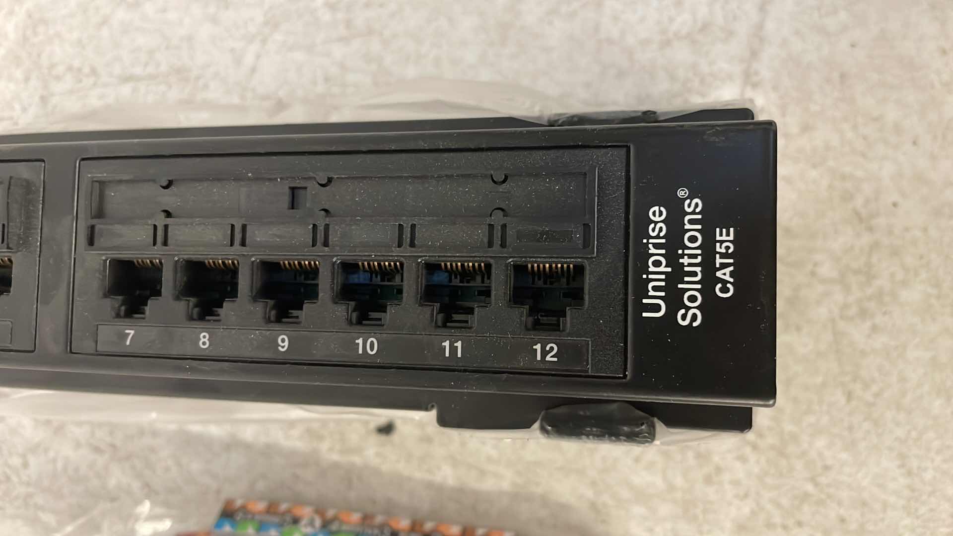 Photo 1 of COMMSCOPE UNIPRISE WALL MOUNT UNIVERSAL CAT5 PANEL 12 PORT