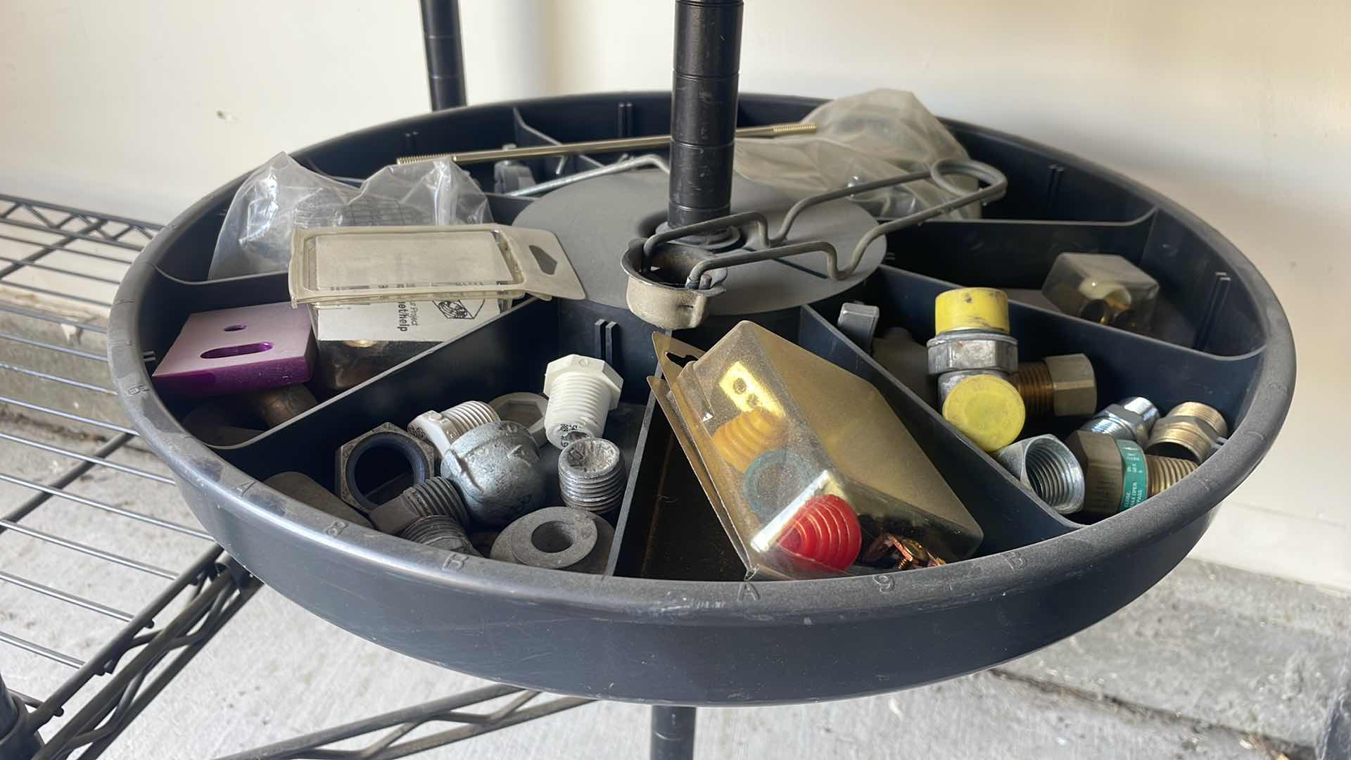 Photo 1 of PROFESSIONAL CHOICE 4 SHELF WIRE RACK PLUS CAROUSEL ATTACHMENT ON END WITH CONTENTS