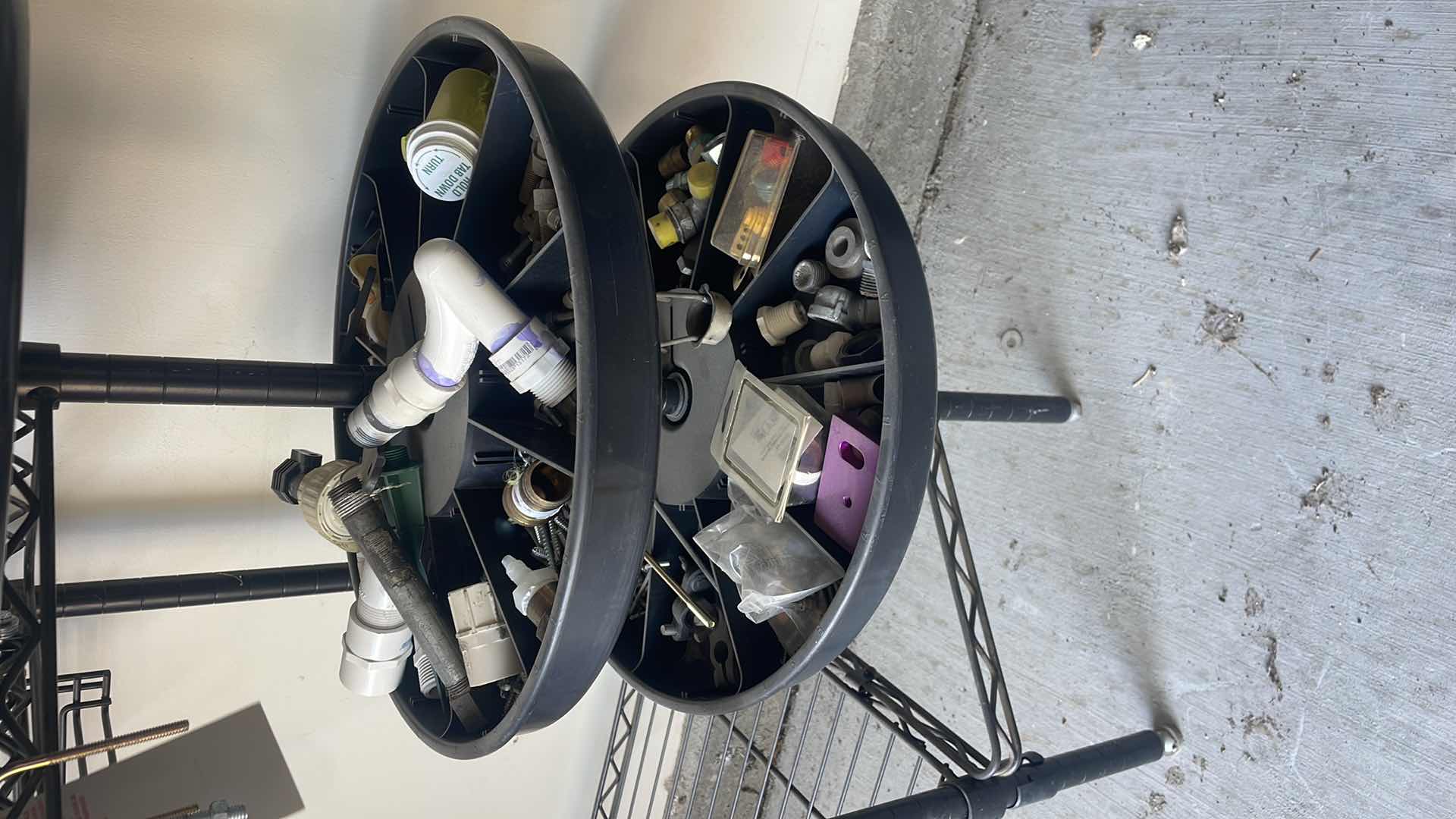 Photo 1 of PROFESSIONAL CHOICE 4 SHELF WIRE RACK PLUS CAROUSEL ATTACHMENT ON END WITH CONTENTS