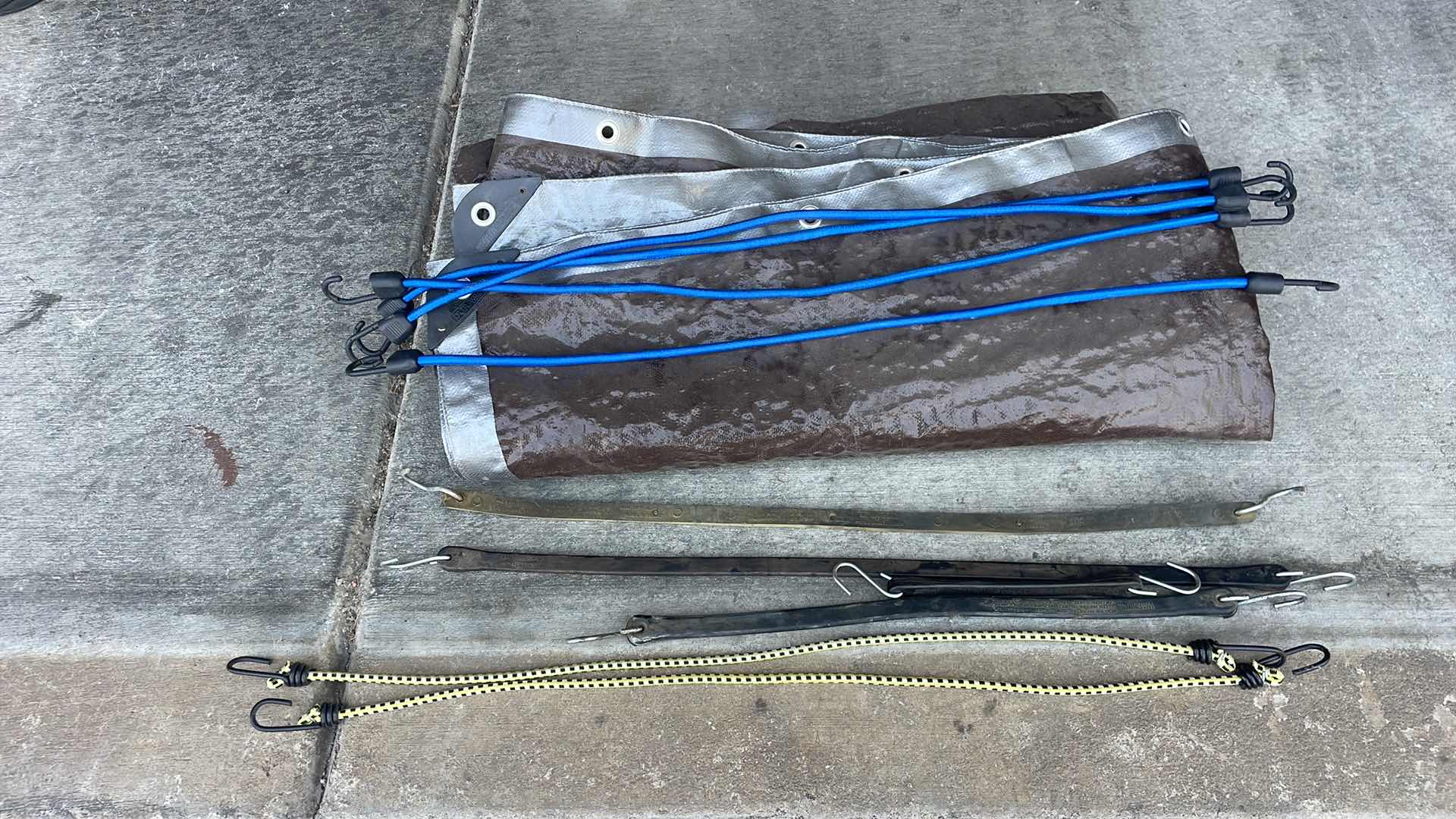 Photo 1 of 10'x10' DURAWORX TARP AND BUNGEE CORDS