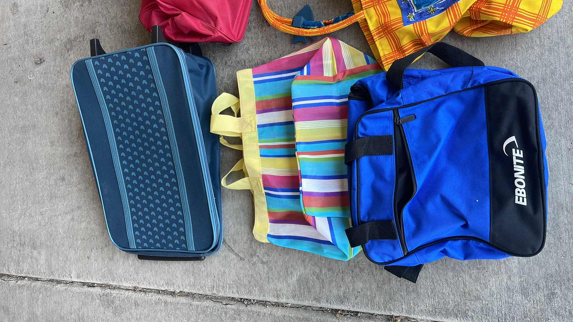 Photo 1 of CARRY ON BAGS AND TOTE BAGS