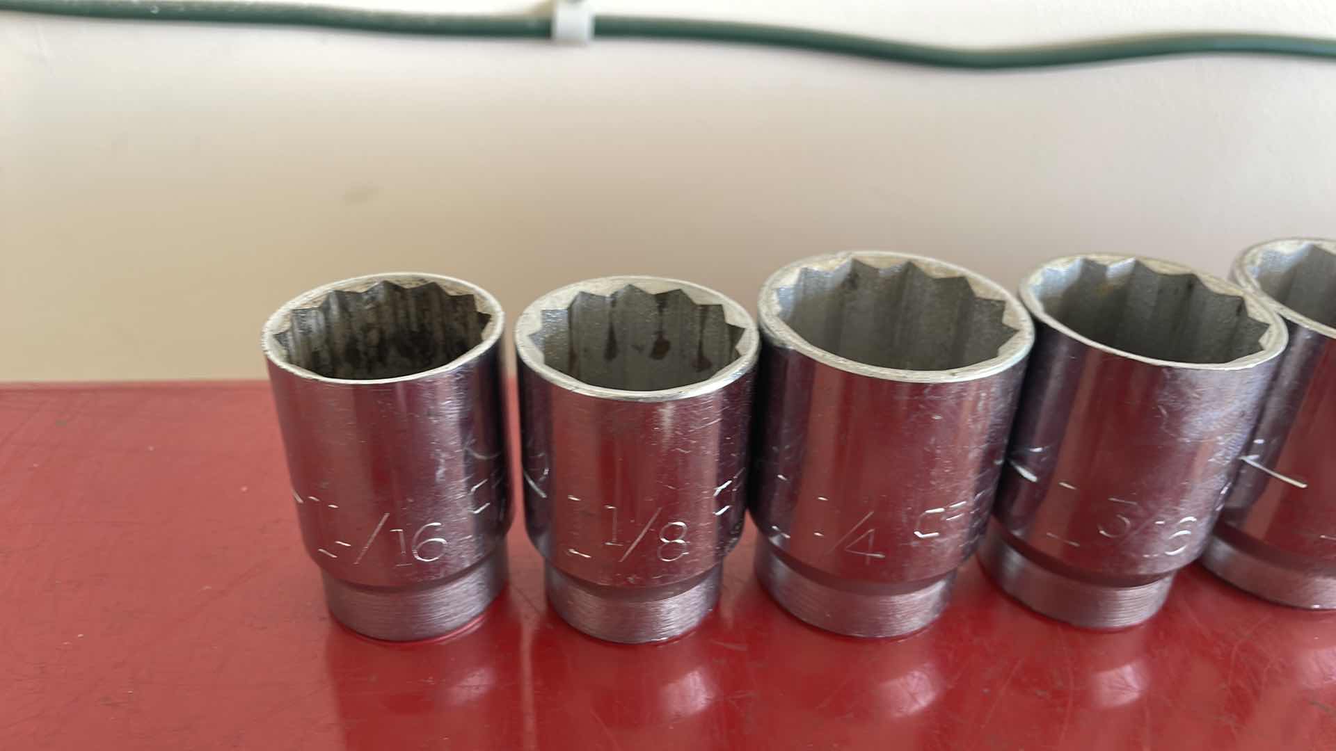 Photo 1 of CRAFTSMAN 3/4” RATCHET 4” EXTENSION AND SOCKETS 1-1/16”-1-7/8