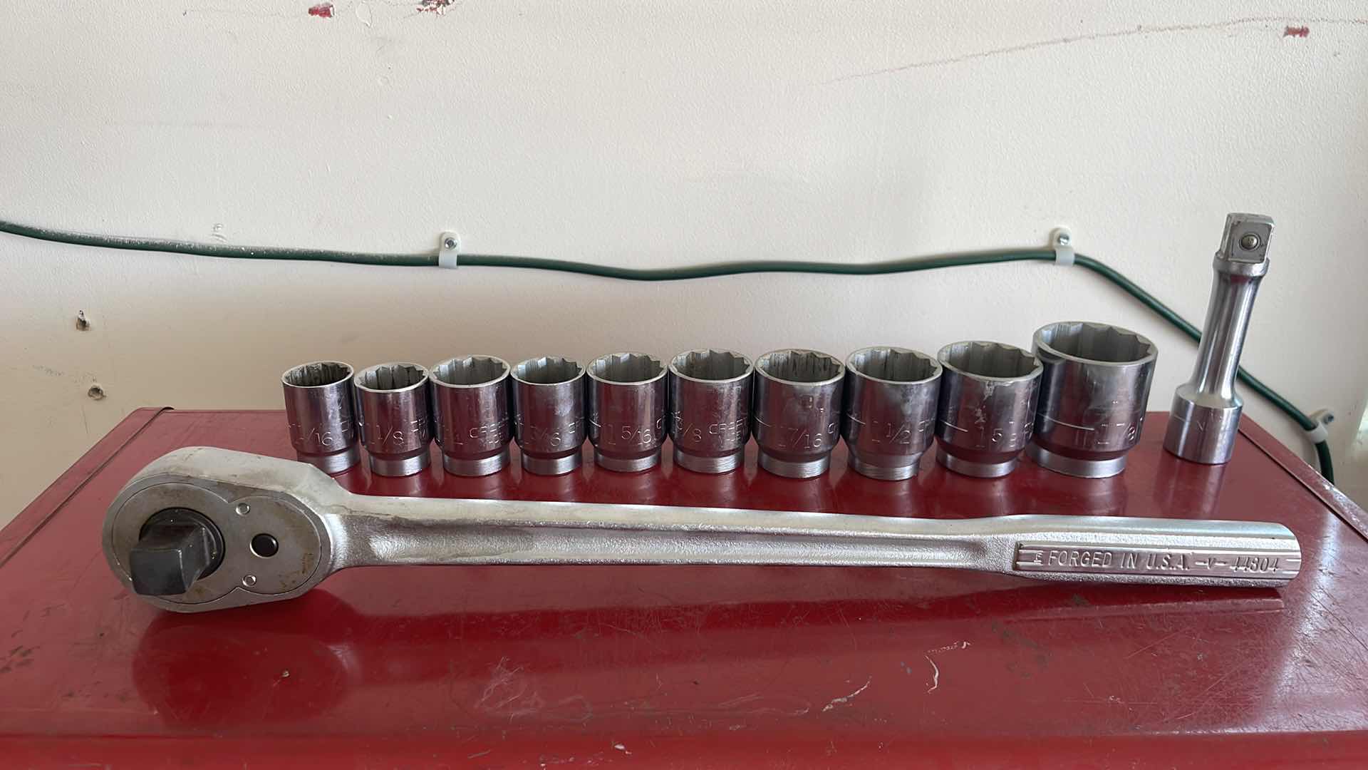 Photo 1 of CRAFTSMAN 3/4” RATCHET 4” EXTENSION AND SOCKETS 1-1/16”-1-7/8