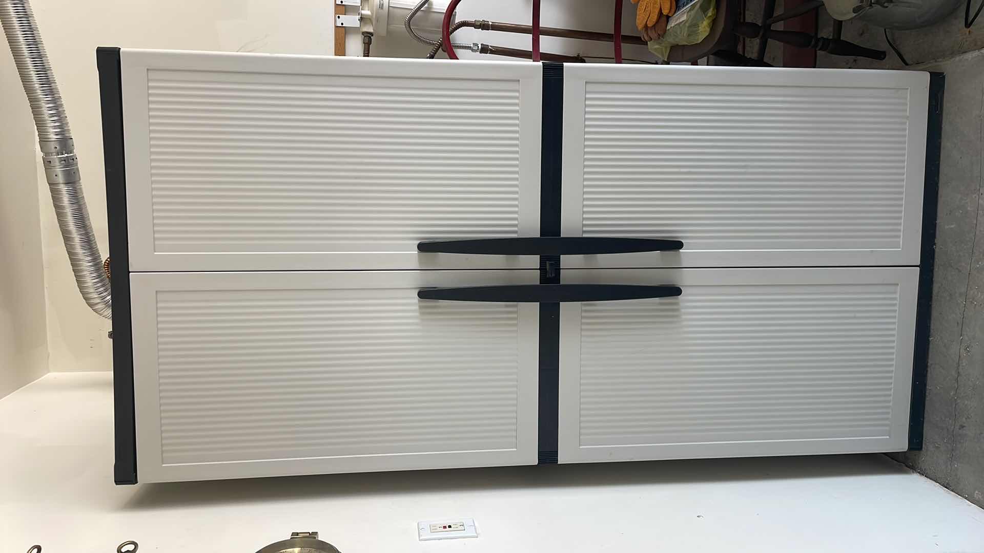 Photo 1 of PLASTIC STORAGE PANTRY 35”x18”x71” WITH CONTENTS