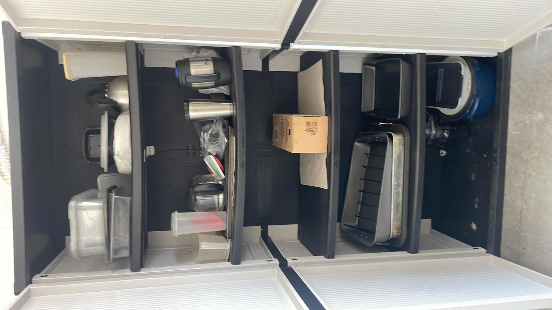 Photo 1 of PLASTIC STORAGE PANTRY 35”x18”x71” WITH CONTENTS