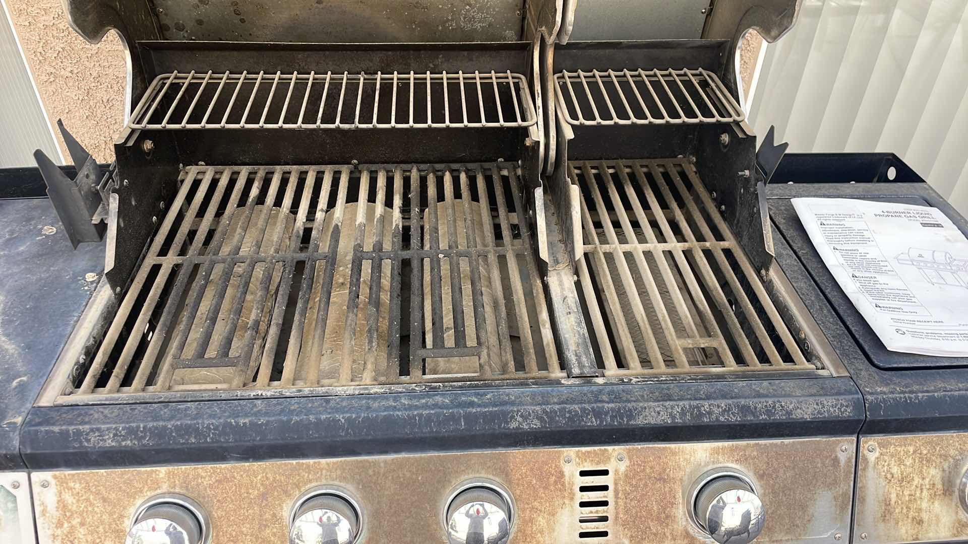 Photo 1 of MASTER FORGE 4-BURNER LIQUID PROPANE GAS GRILL