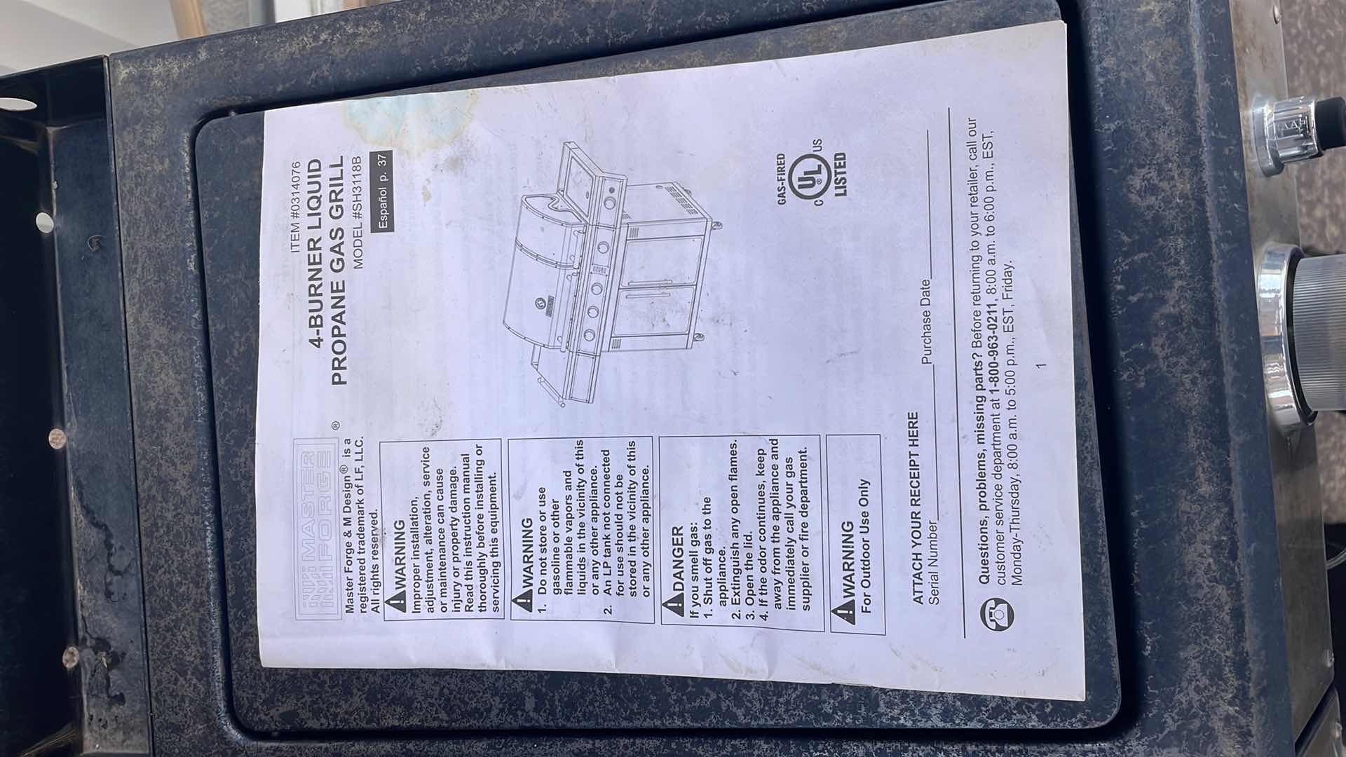 Photo 1 of MASTER FORGE 4-BURNER LIQUID PROPANE GAS GRILL