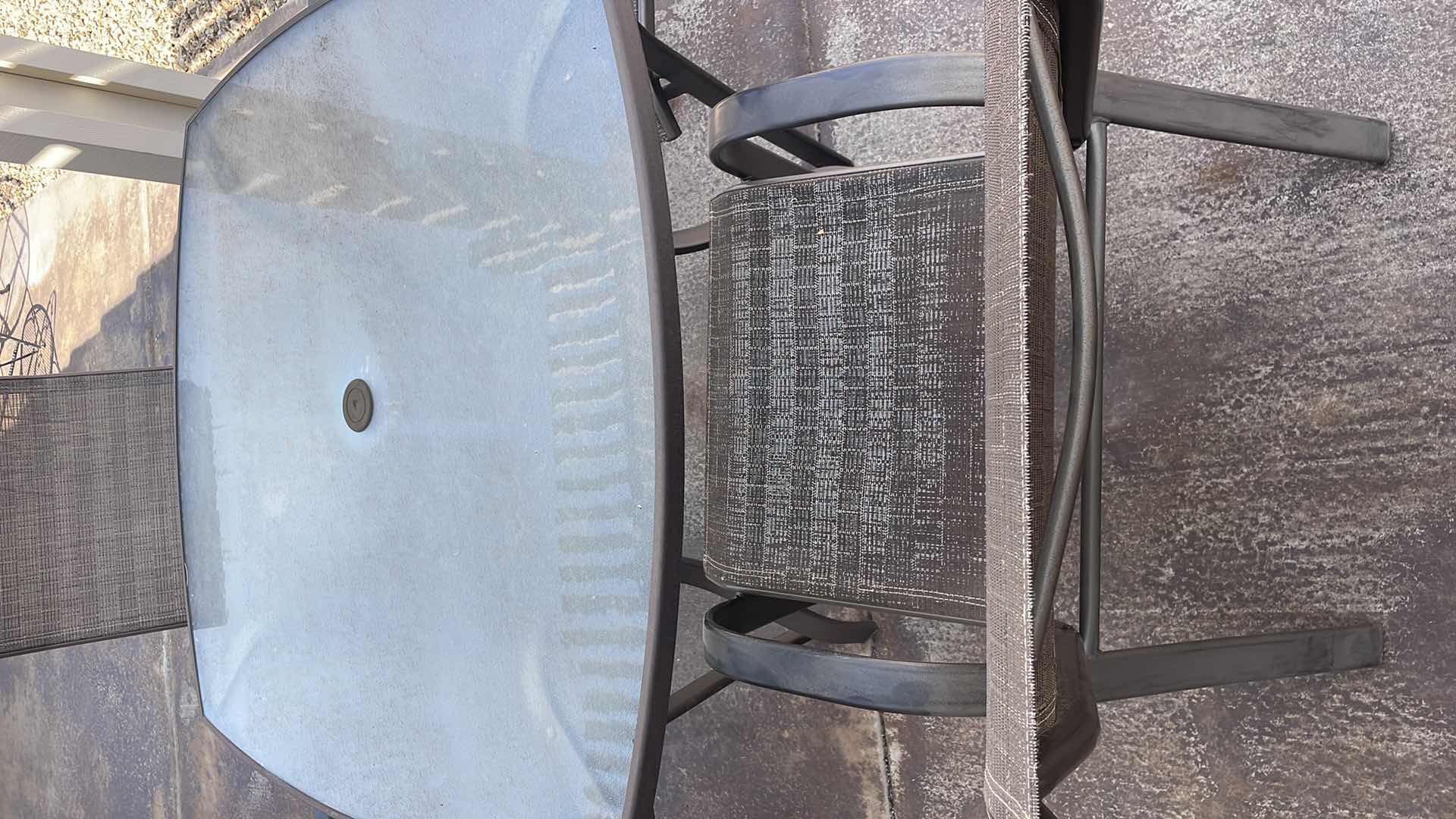 Photo 1 of PATIO TABLE 45” AND 4 CHAIRS