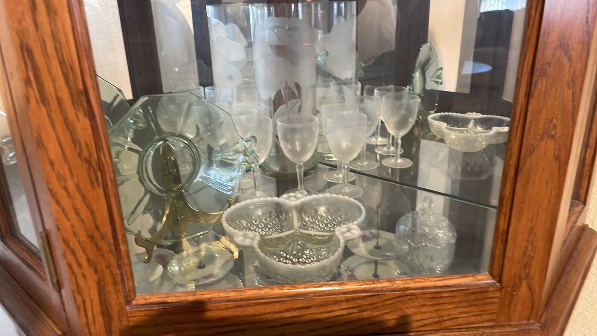 Photo 1 of LIGHTED OAK CORNER CURIO CABINET WITH CONTENTS