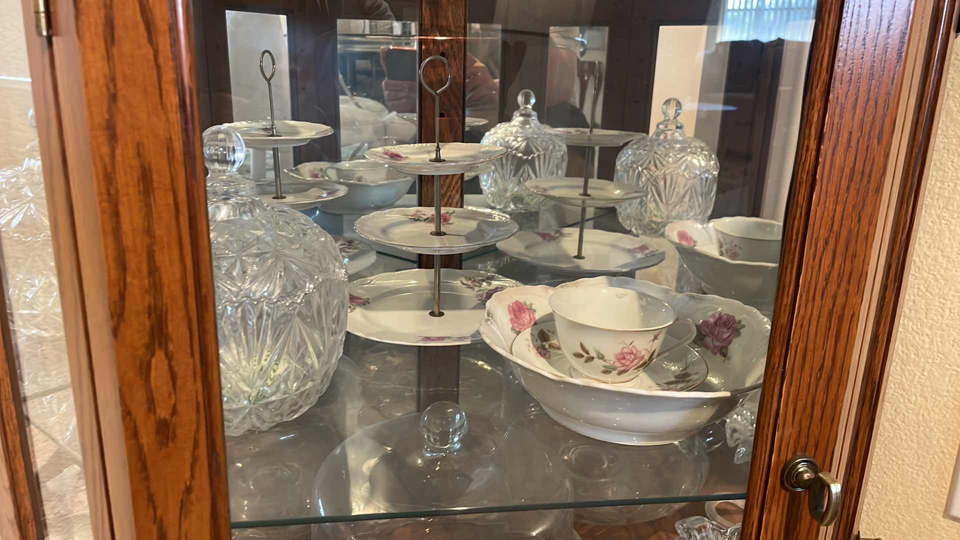 Photo 1 of LIGHTED OAK CORNER CURIO CABINET WITH CONTENTS