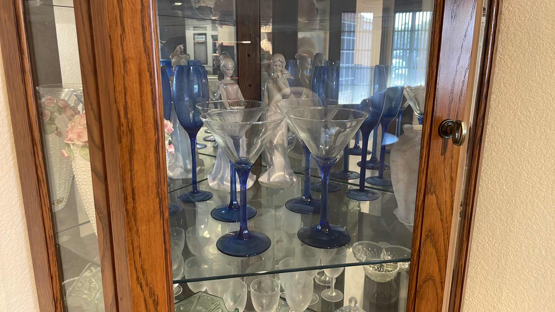 Photo 1 of LIGHTED OAK CORNER CURIO CABINET WITH CONTENTS