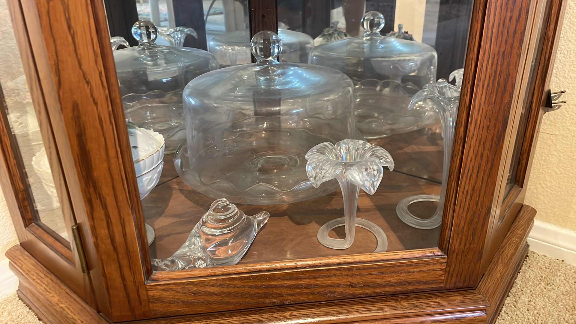 Photo 1 of LIGHTED OAK CORNER CURIO CABINET WITH CONTENTS