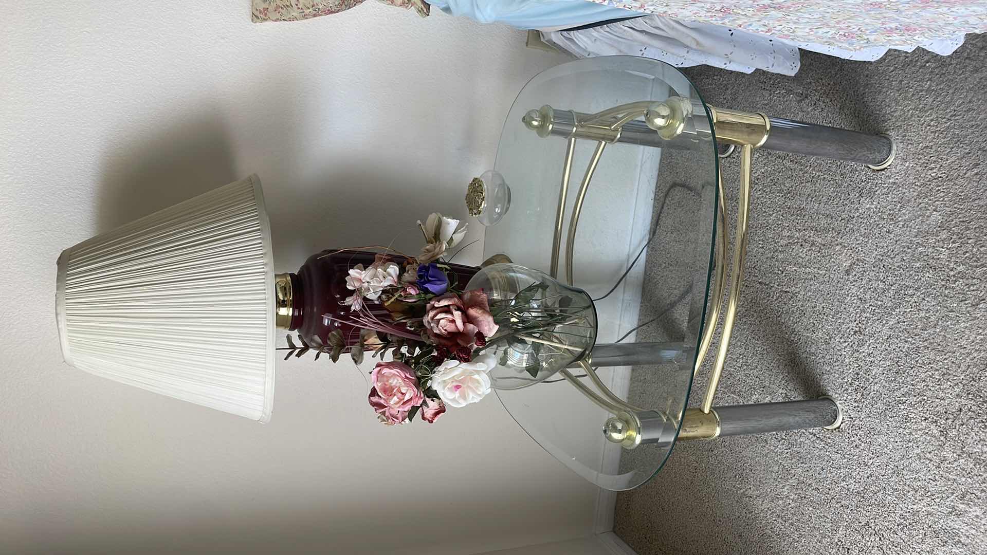 Photo 1 of GLASS END TABLE 27”x27” WITH 31” LAMP AND FAUX FLOWERS