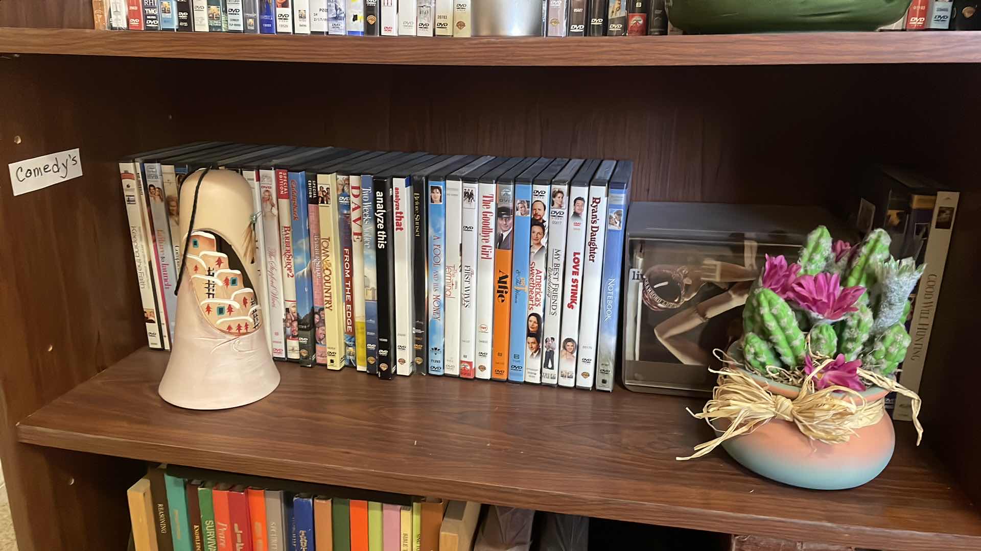 Photo 1 of BOOKCASE WITH CONTENTS 29”x12”x32” MOVIES COMEDIES FAITH BASED BOOKS