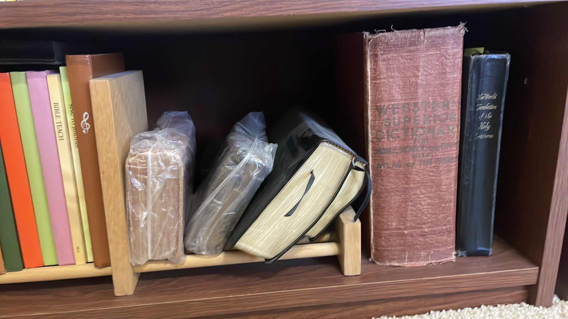 Photo 1 of BOOKCASE WITH CONTENTS 29”x12”x32” MOVIES COMEDIES FAITH BASED BOOKS