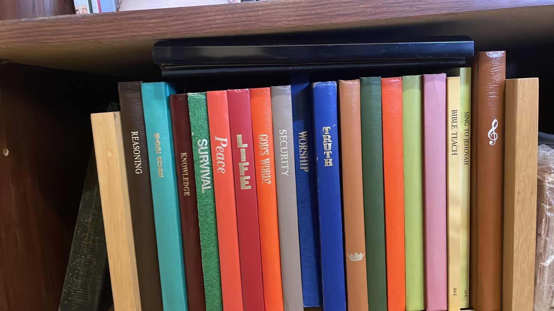 Photo 1 of BOOKCASE WITH CONTENTS 29”x12”x32” MOVIES COMEDIES FAITH BASED BOOKS