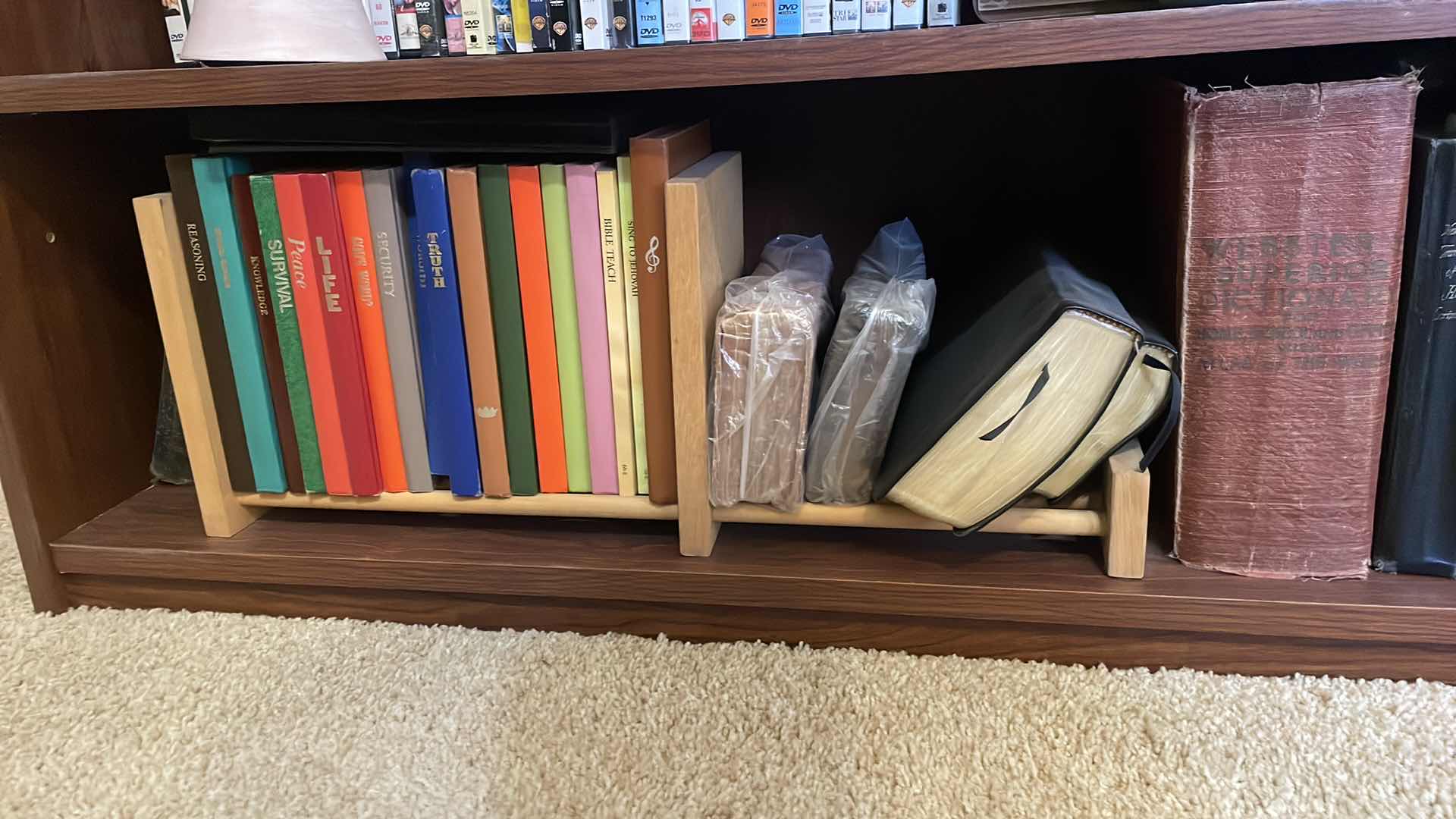 Photo 1 of BOOKCASE WITH CONTENTS 29”x12”x32” MOVIES COMEDIES FAITH BASED BOOKS