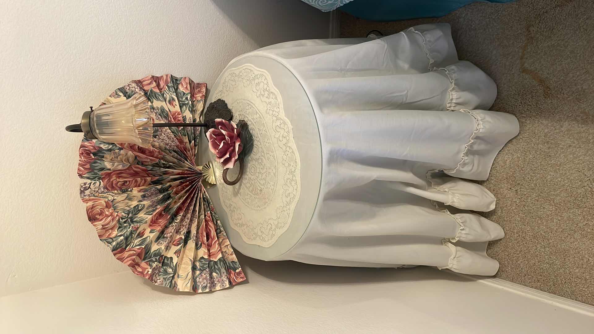 Photo 1 of BED SIDE WOOD/GLASS TOP TABLES (2) 19” DIAMETER 25” HEIGHT WITH DECOR. BED NOT INCLUDED