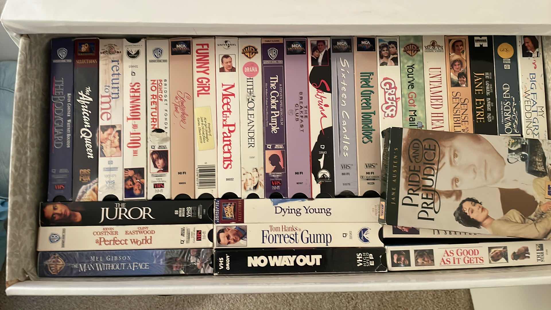 Photo 1 of CARDBOARD DRESSER FULL OF VHS SEE PICTURES 24”x12”x28”