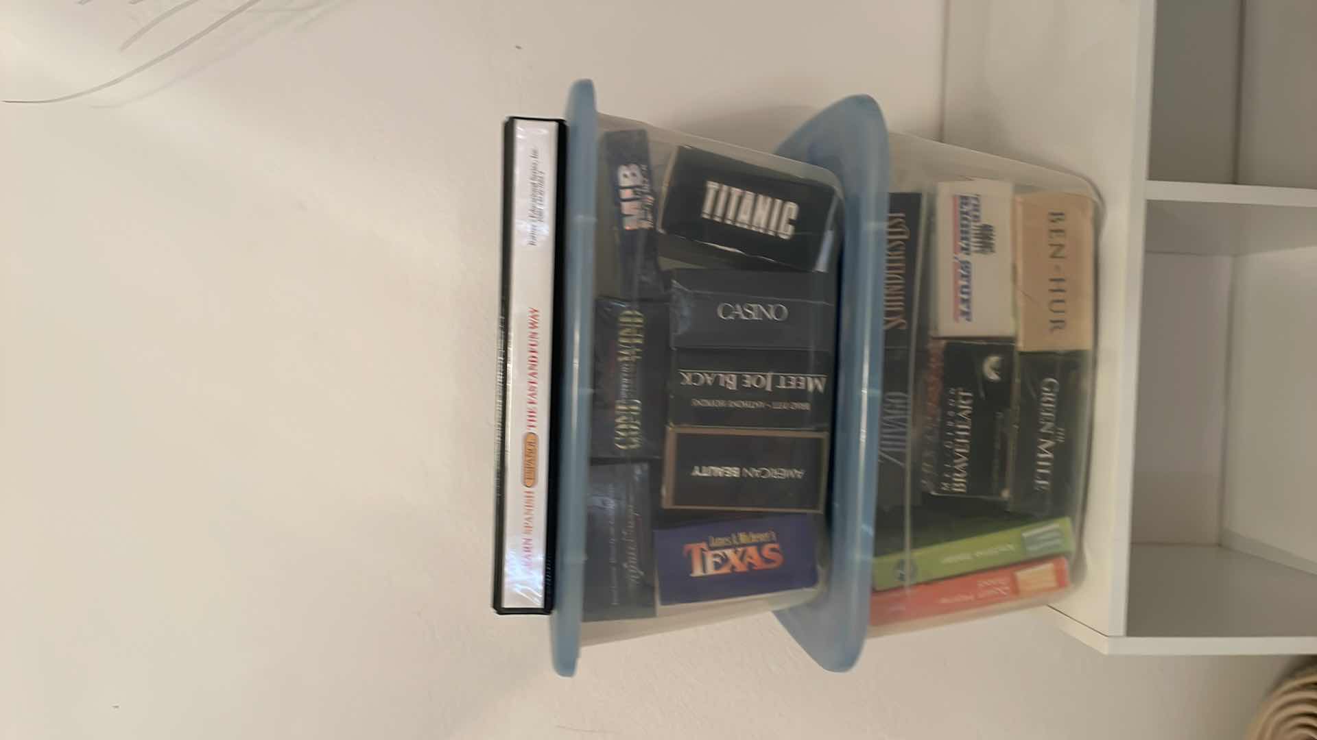 Photo 1 of TOTES WITH VHS MOVIES SERIES AND LEARN SPANISH CASSETTES