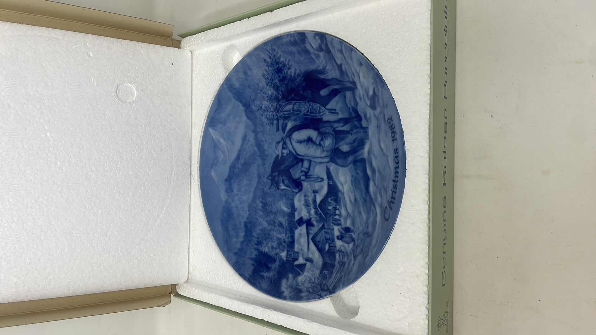 Photo 1 of KAISER PORCELAIN COLLECTOR PLATE FROM 1982 TITLED "BRINGING HOME THE CHRISTMAS TREE"