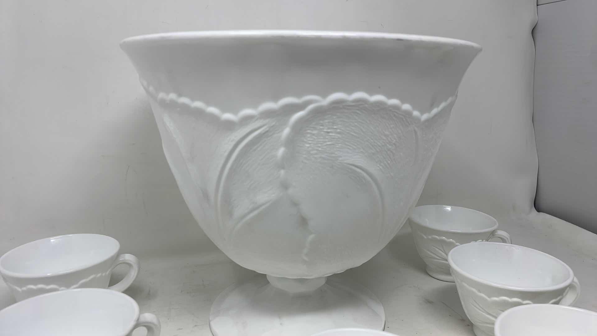 Photo 1 of INDIANA GLASS PEBBLE LEAF DESIGN MILK GLASS  PUNCH BOWL AND 11 CUPS 10" X 10"