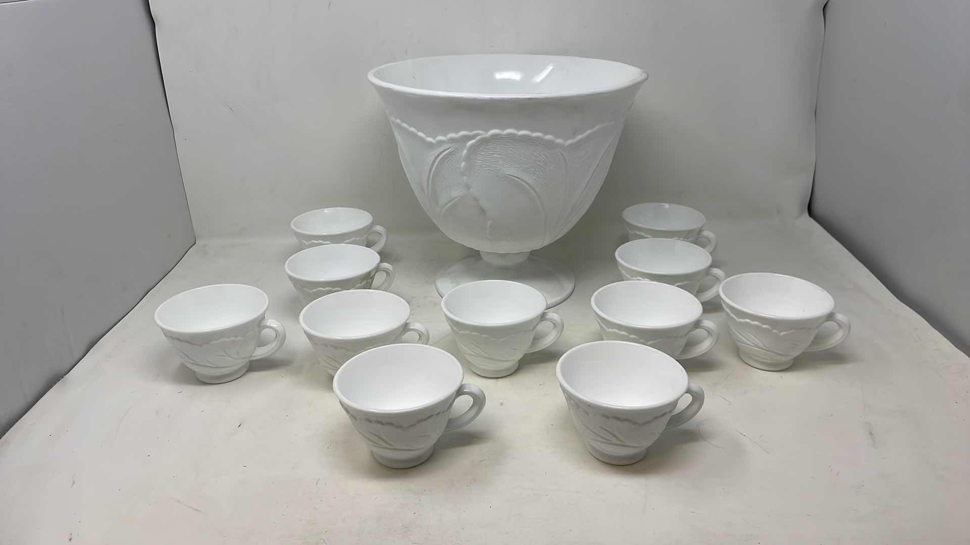 Photo 1 of INDIANA GLASS PEBBLE LEAF DESIGN MILK GLASS  PUNCH BOWL AND 11 CUPS 10" X 10"