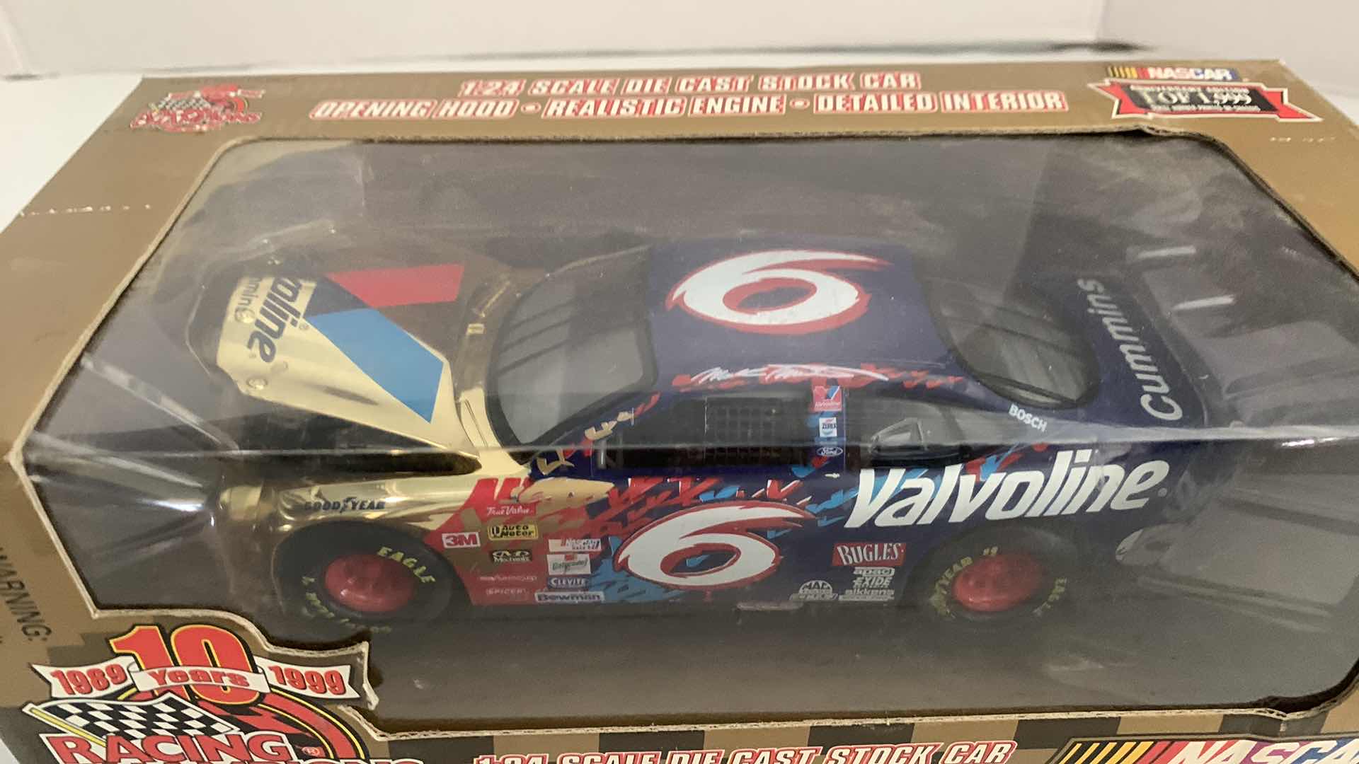 Photo 1 of NASCAR 10TH ANNIVERSARY RACING CHAMPIONS MARK MARTIN NUMBER 6 1/24 SCALE DIECAST STOCK CAR 1/1999