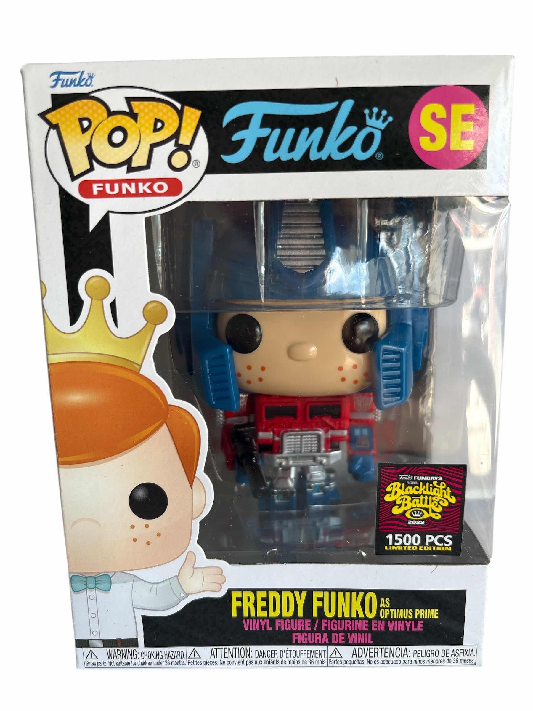 Photo 1 of NIB FUNKO POP FREDDY FUNKO AS OPTIMUS PRIME SE BLACKLIGHT BATTLE