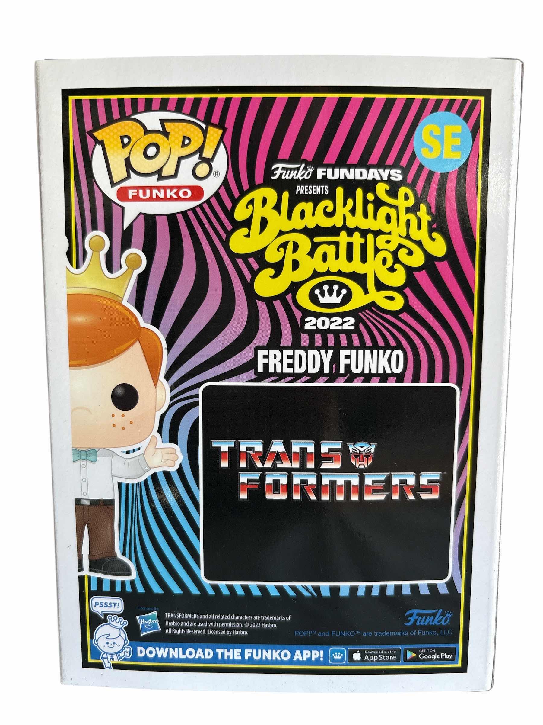 Photo 1 of NIB FUNKO POP FREDDY FUNKO AS OPTIMUS PRIME SE BLACKLIGHT BATTLE