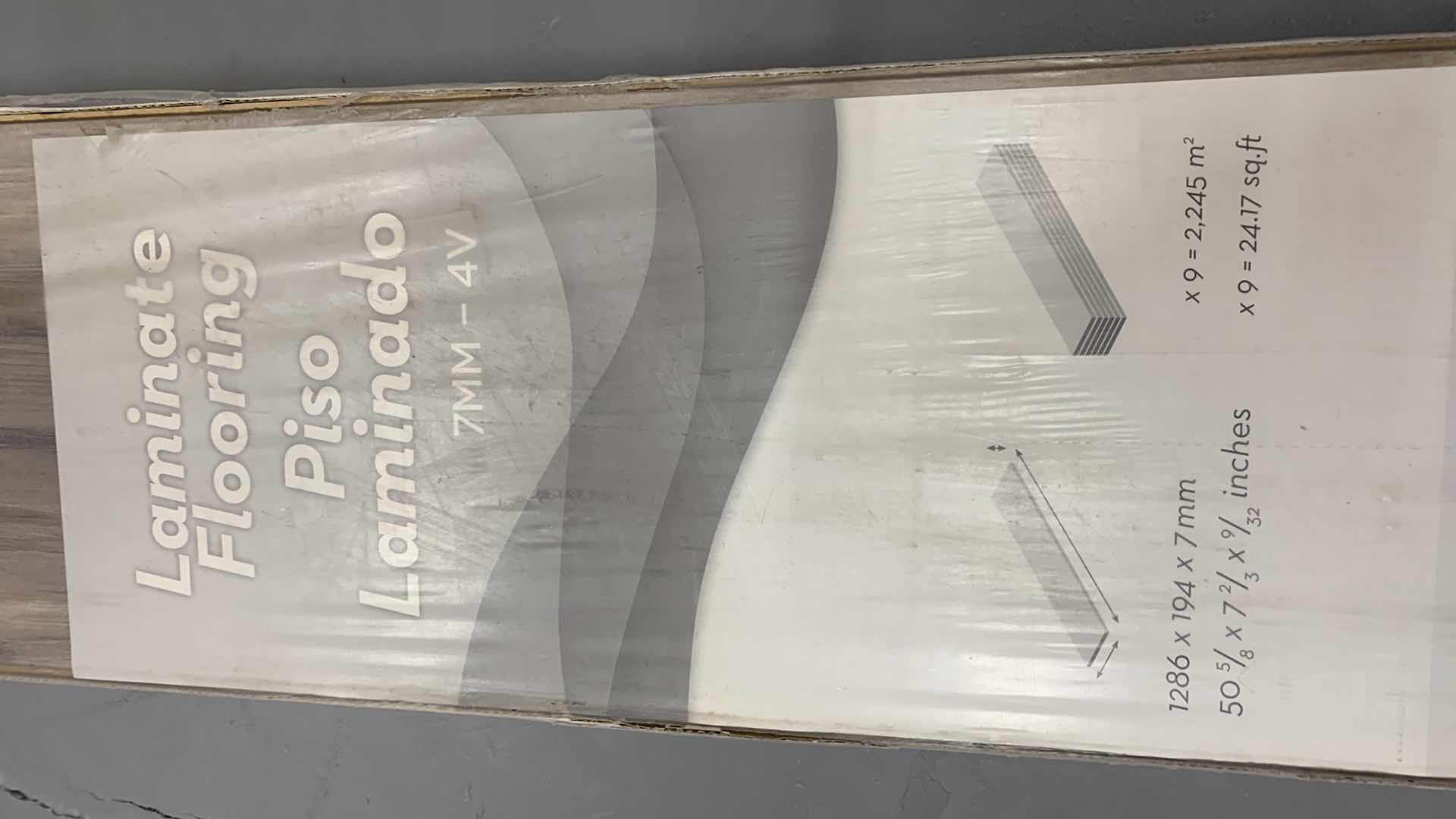 Photo 2 of 9-PIECES OF LAMINATE FLOORING WITH GREENGUARD 24.7” SQ. FT LAKESHORE P BRONZE