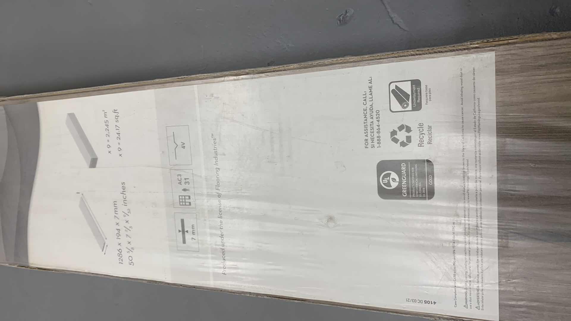 Photo 1 of 9-PIECES OF LAMINATE FLOORING WITH GREENGUARD 24.7” SQ. FT LAKESHORE P BRONZE