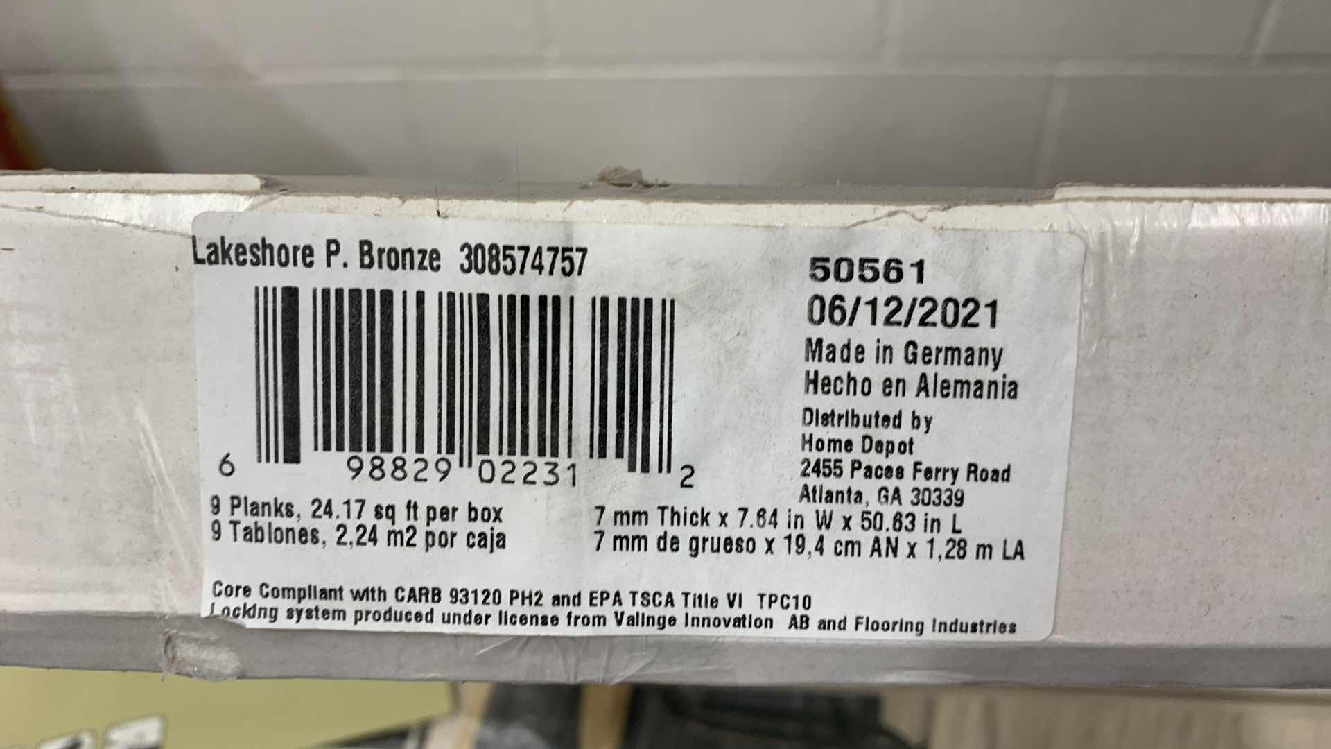Photo 1 of 9-PIECES OF LAMINATE FLOORING WITH GREENGUARD 24.7” SQ. FT LAKESHORE P BRONZE