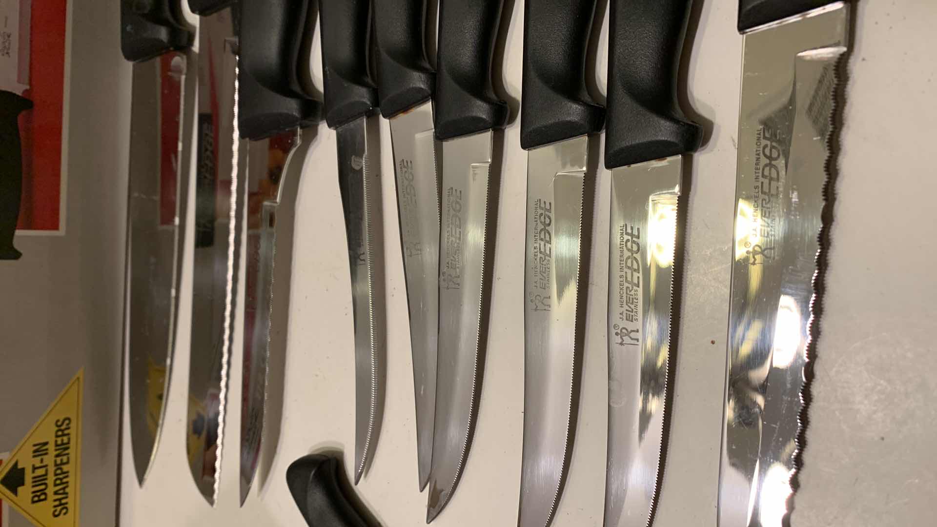 Photo 2 of J.A. HENCKELS KNIFE SET, WILKINSON KNIFE SET AND SHARPENING STONES