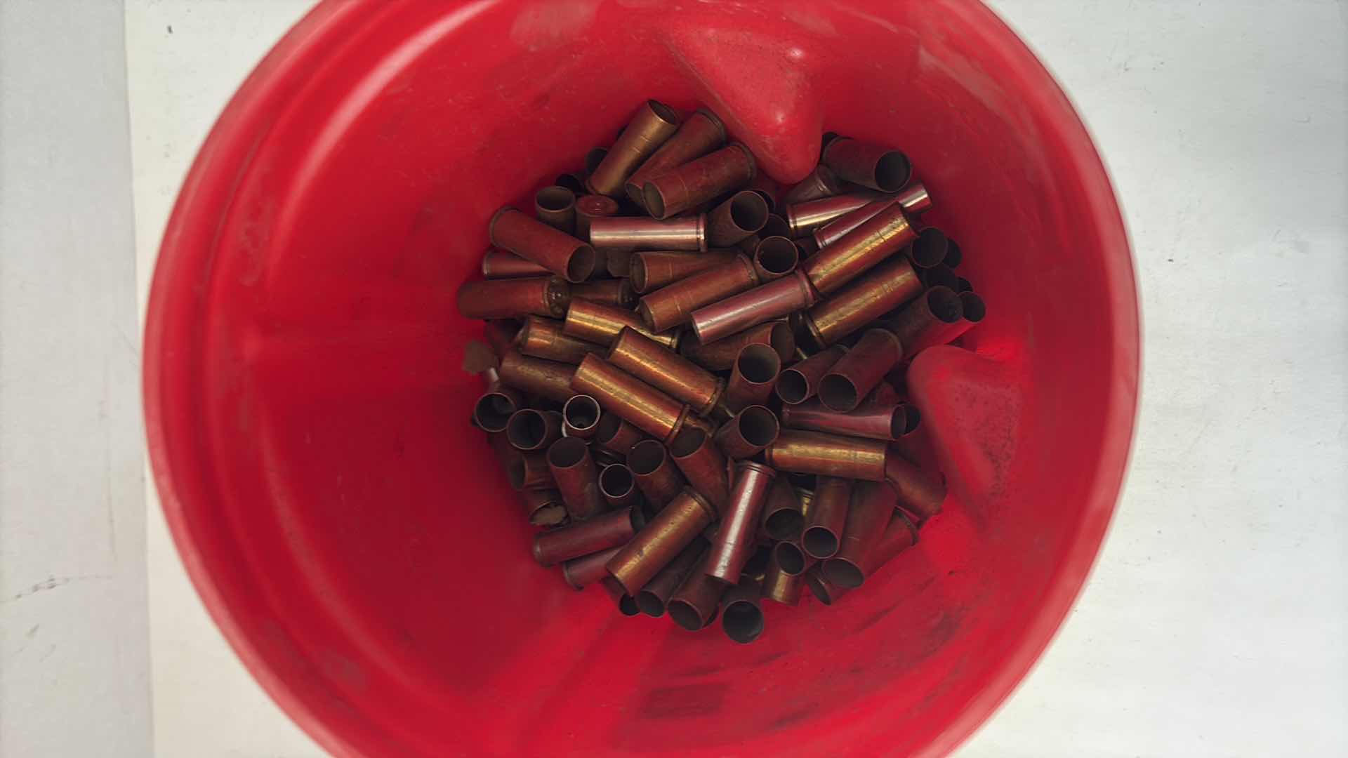 Photo 1 of CONTENTS OF CONTAINER BRASS SHELL CASING VARIOUS CALIBERS