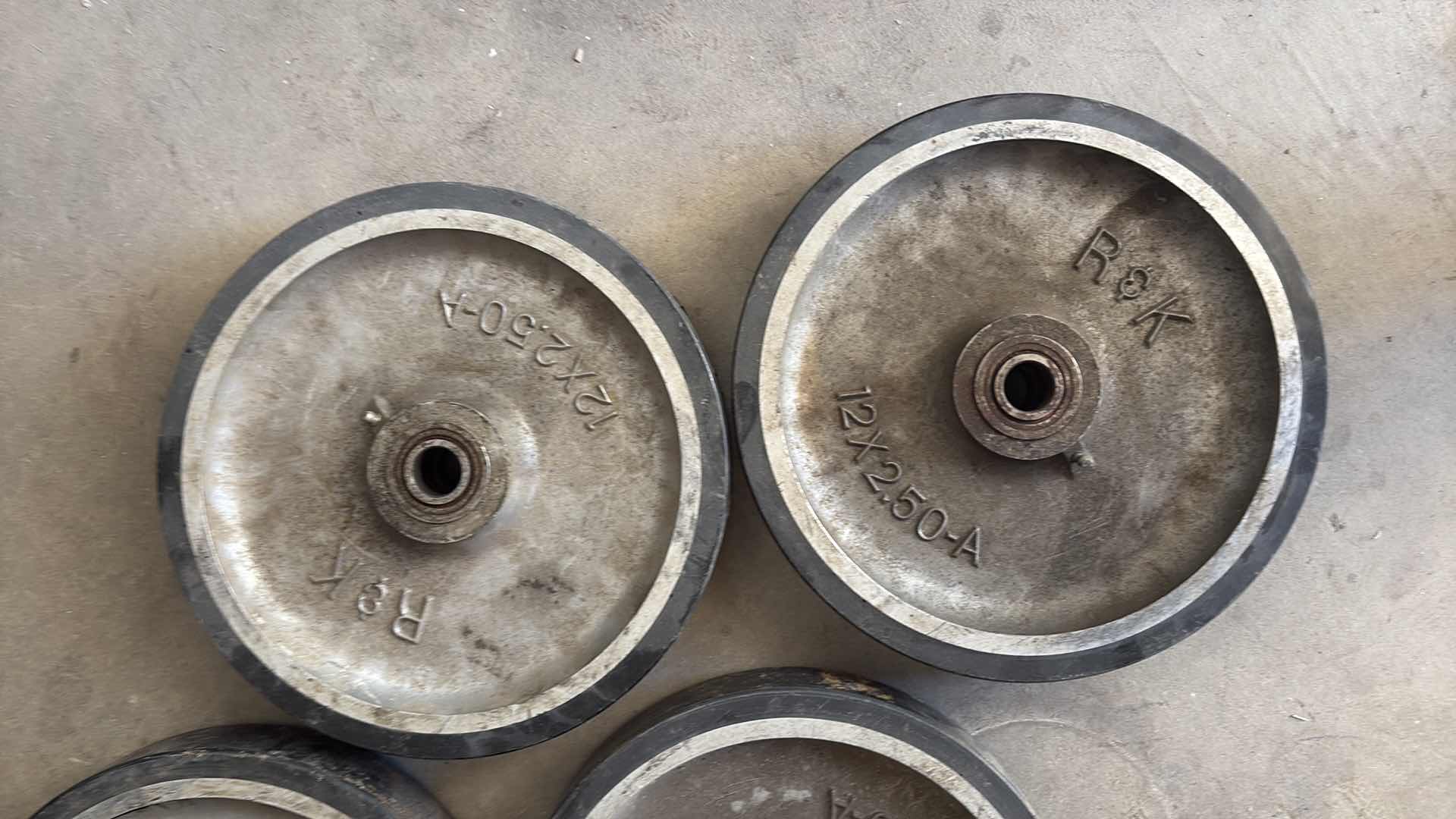 Photo 1 of 4-PCS 12” X 2.5" METAL AND RUBBER WHEEL WITH BEARINGS