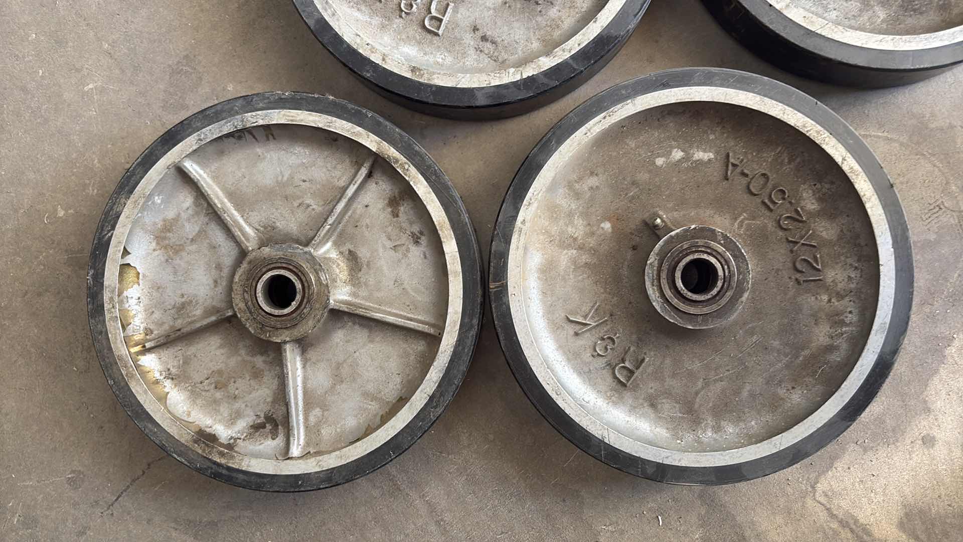 Photo 1 of 4-PCS 12” X 2.5" METAL AND RUBBER WHEEL WITH BEARINGS