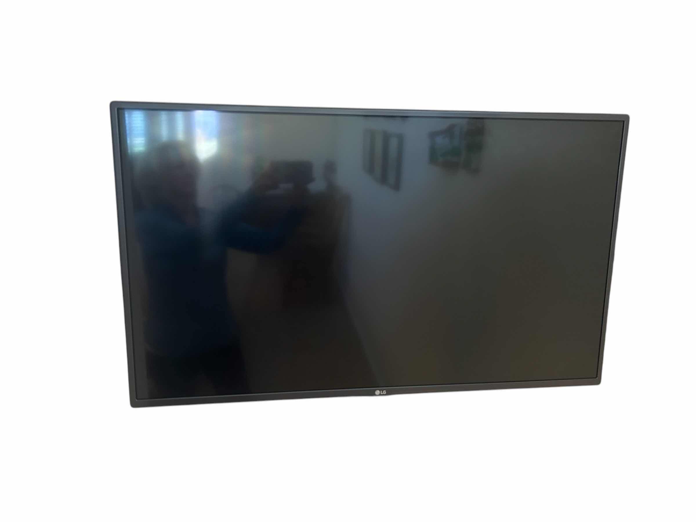 Photo 1 of LG  42” FLAT SCREEN TV W REMOTE