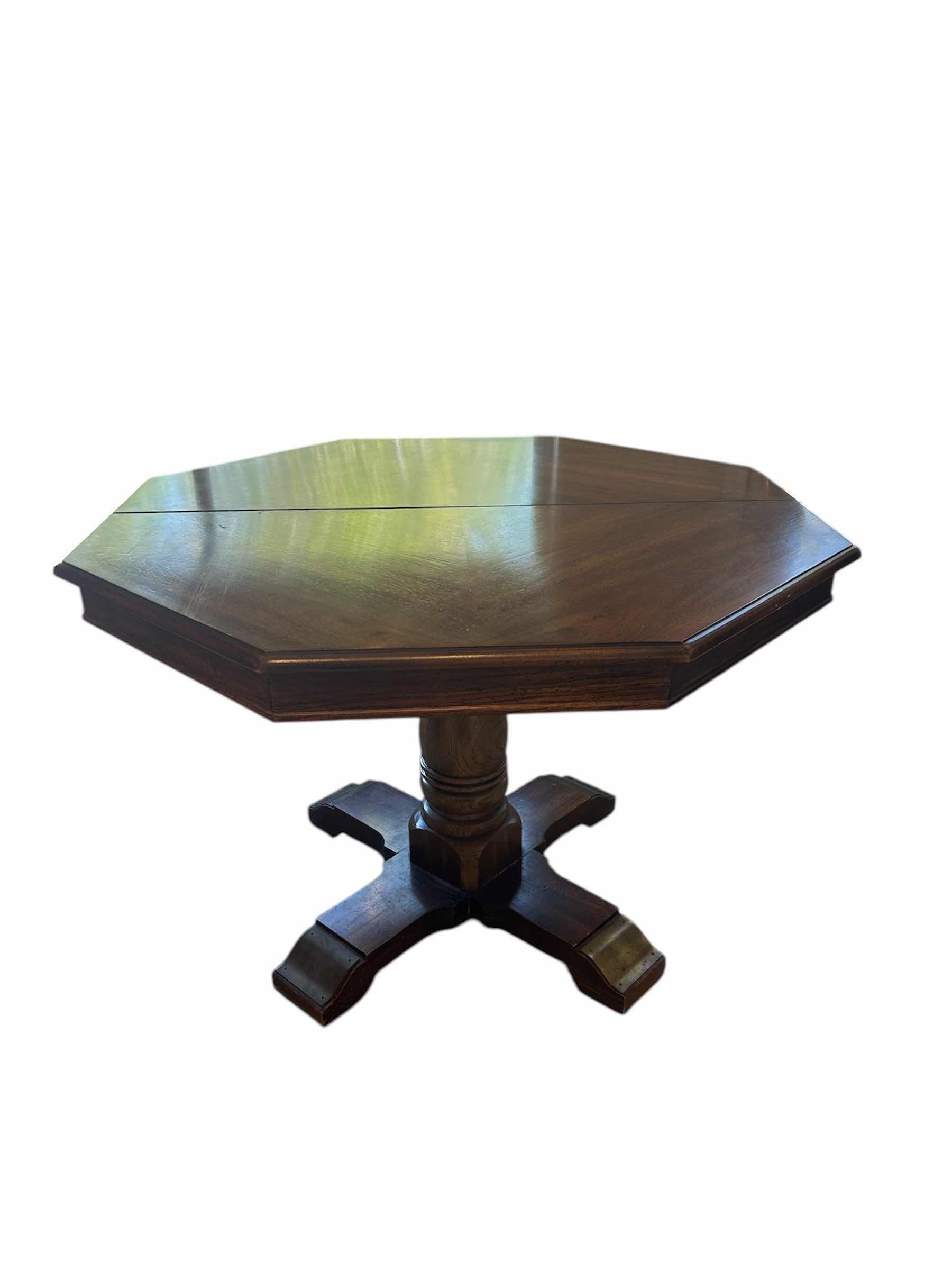 Photo 1 of VINTAGE SOLID WOOD OCTAGON PEDESTAL DINING TABLE W PAD AND 2 LEAVES 43” X 31”