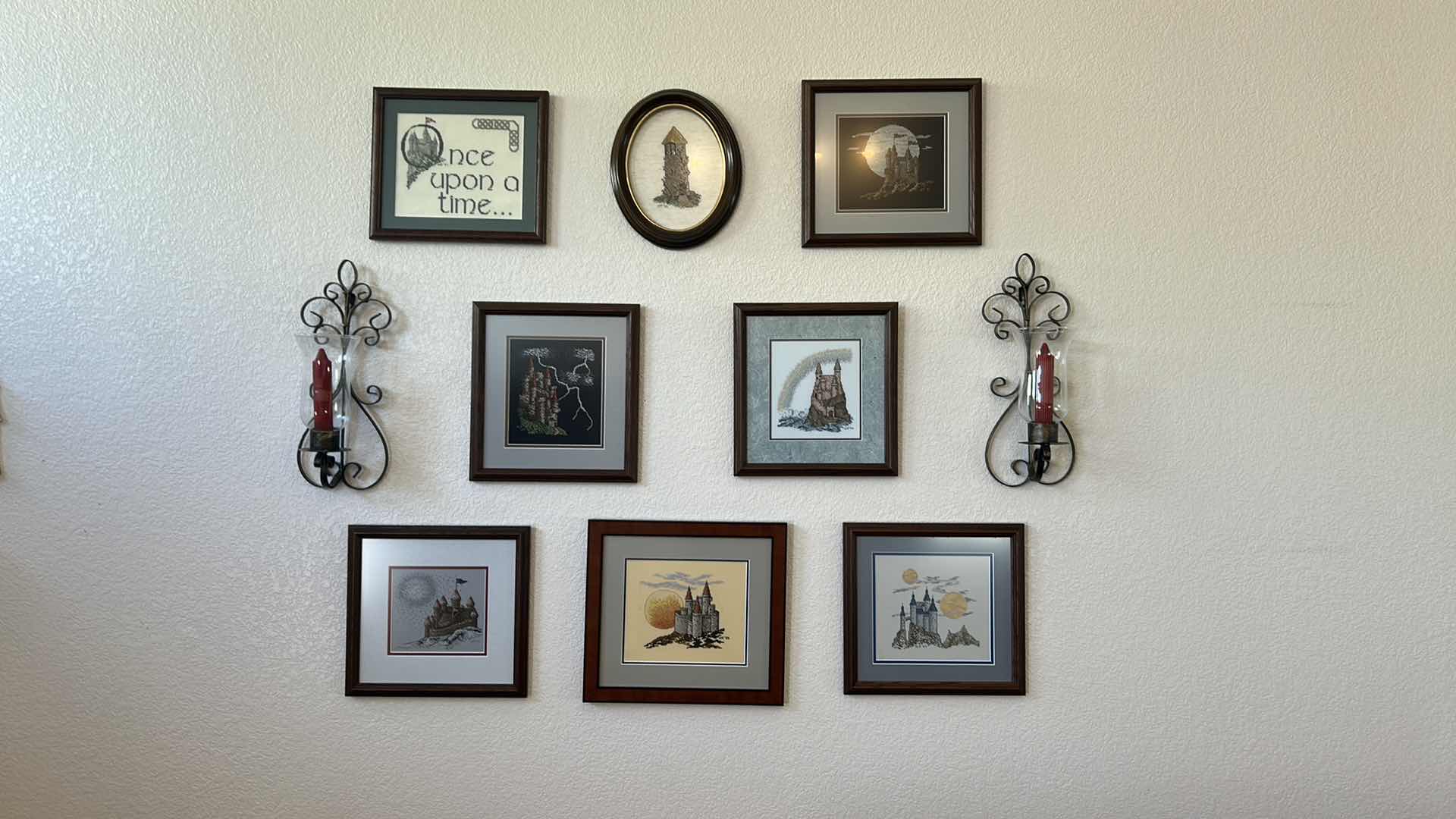 Photo 1 of 8- ASSORTED FRAMED CROSS STITCH CASTLES  2- METAL CANDLE SCONCES 