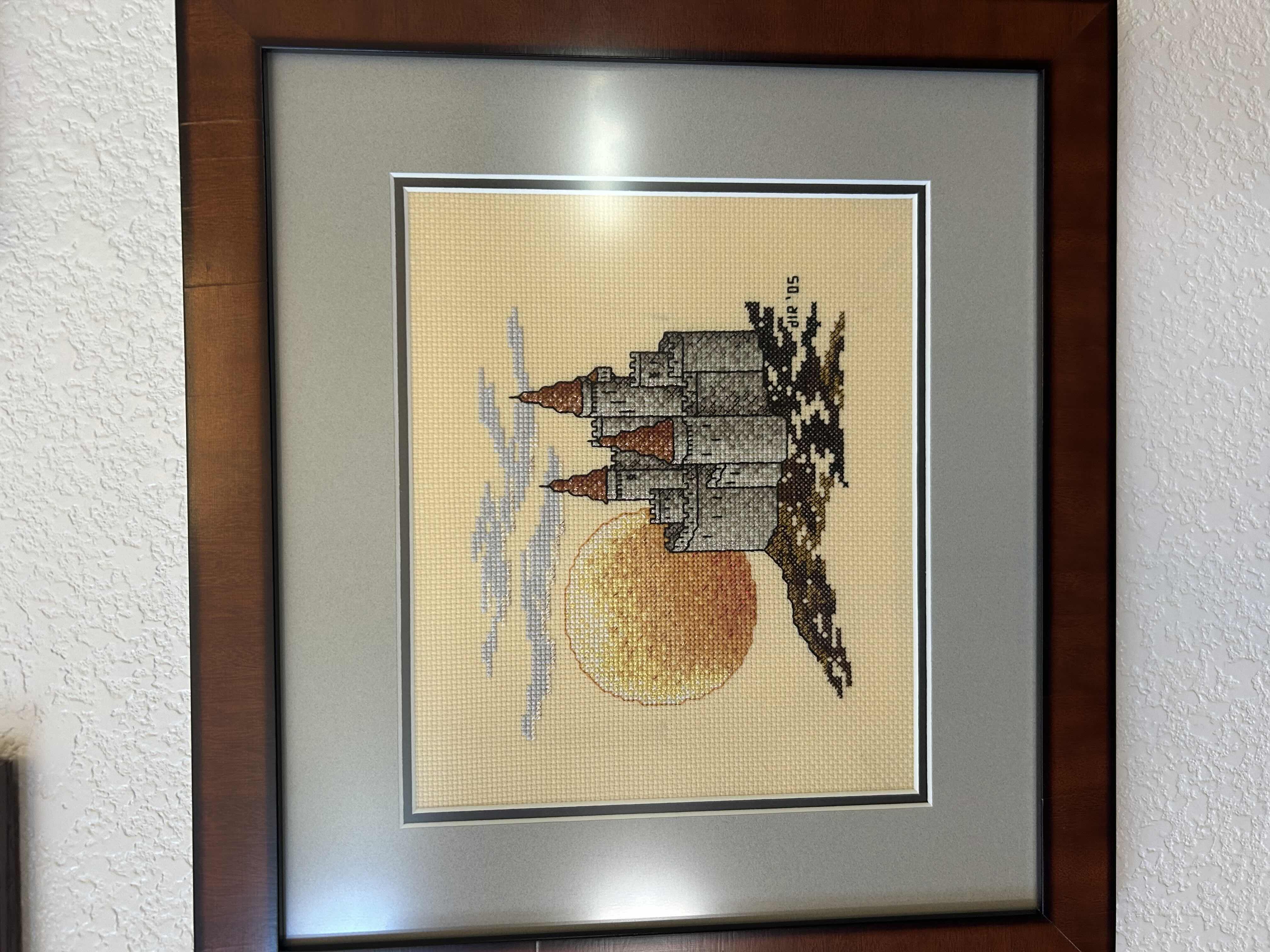 Photo 2 of 8- ASSORTED FRAMED CROSS STITCH CASTLES  2- METAL CANDLE SCONCES 