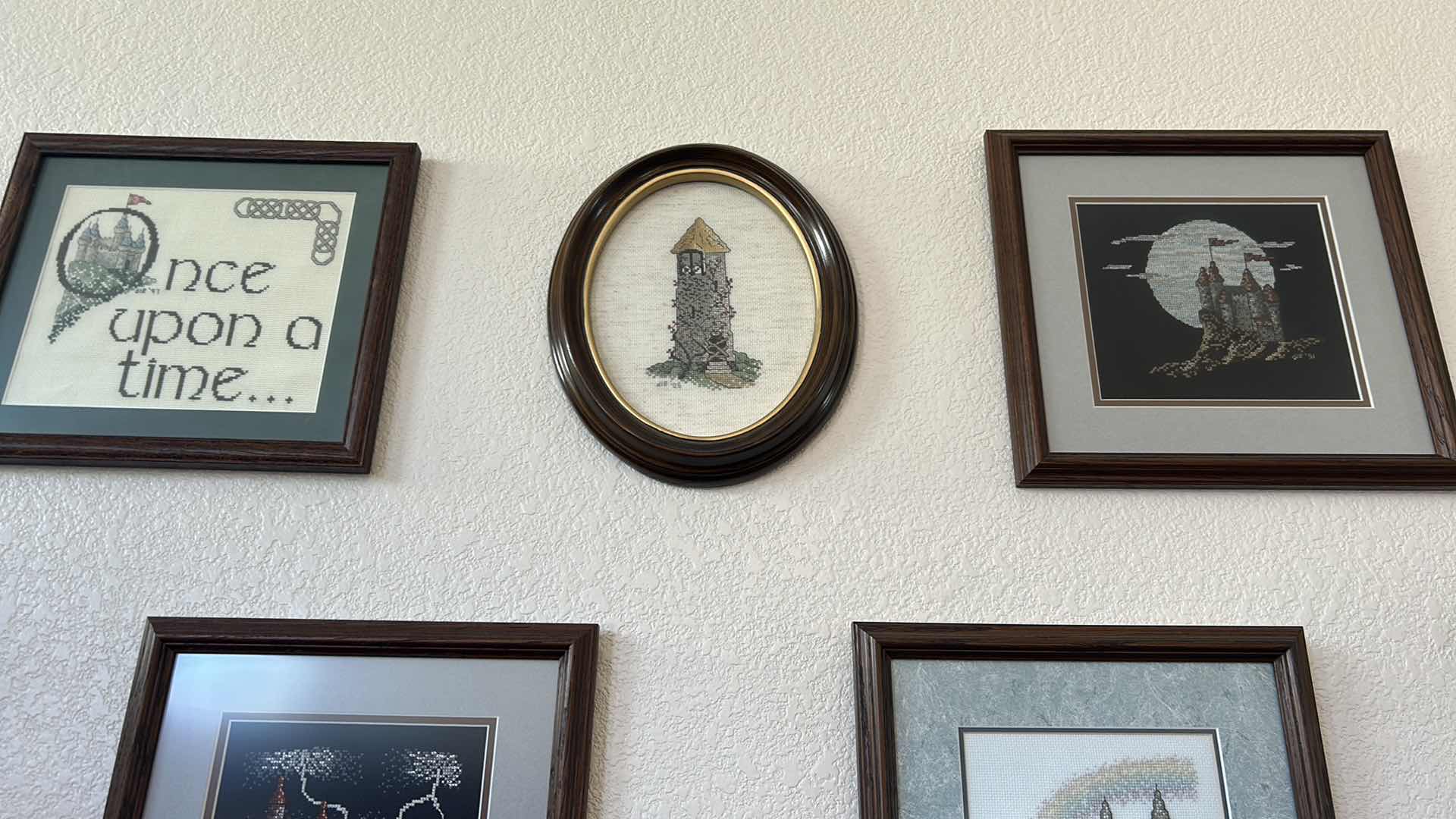 Photo 1 of 8- ASSORTED FRAMED CROSS STITCH CASTLES  2- METAL CANDLE SCONCES 